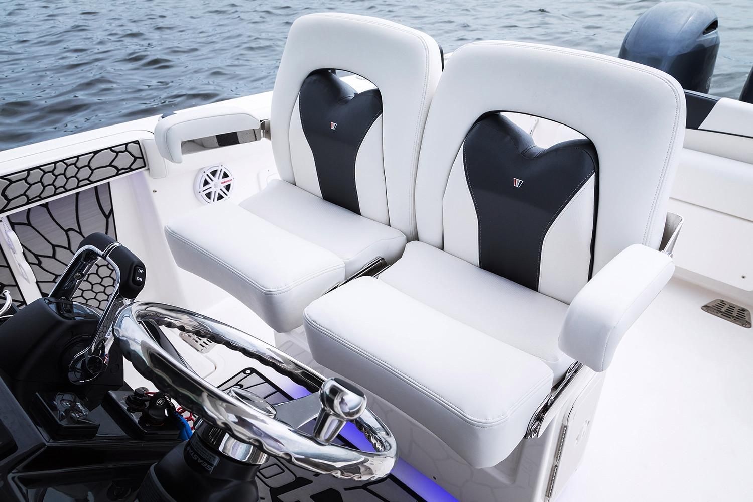 2019 Wellcraft 262 Fisherman boat seats and steering wheel.