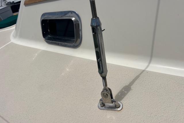Close-up of a 1991 Caliber 33 sailboat deck with rigging hardware.