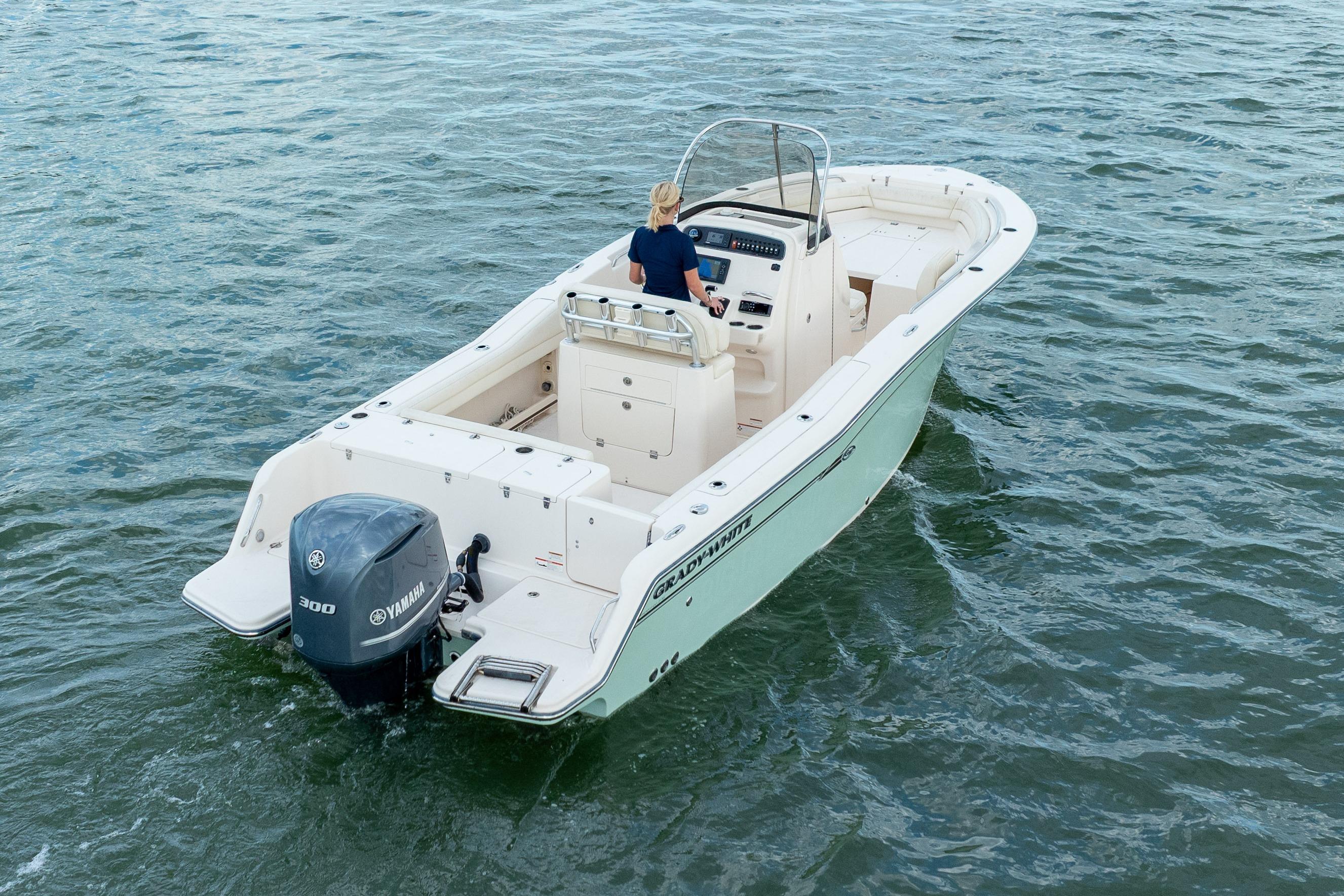2018 Grady-White Fisherman 236 boat on water, featuring Yamaha 300 engine.