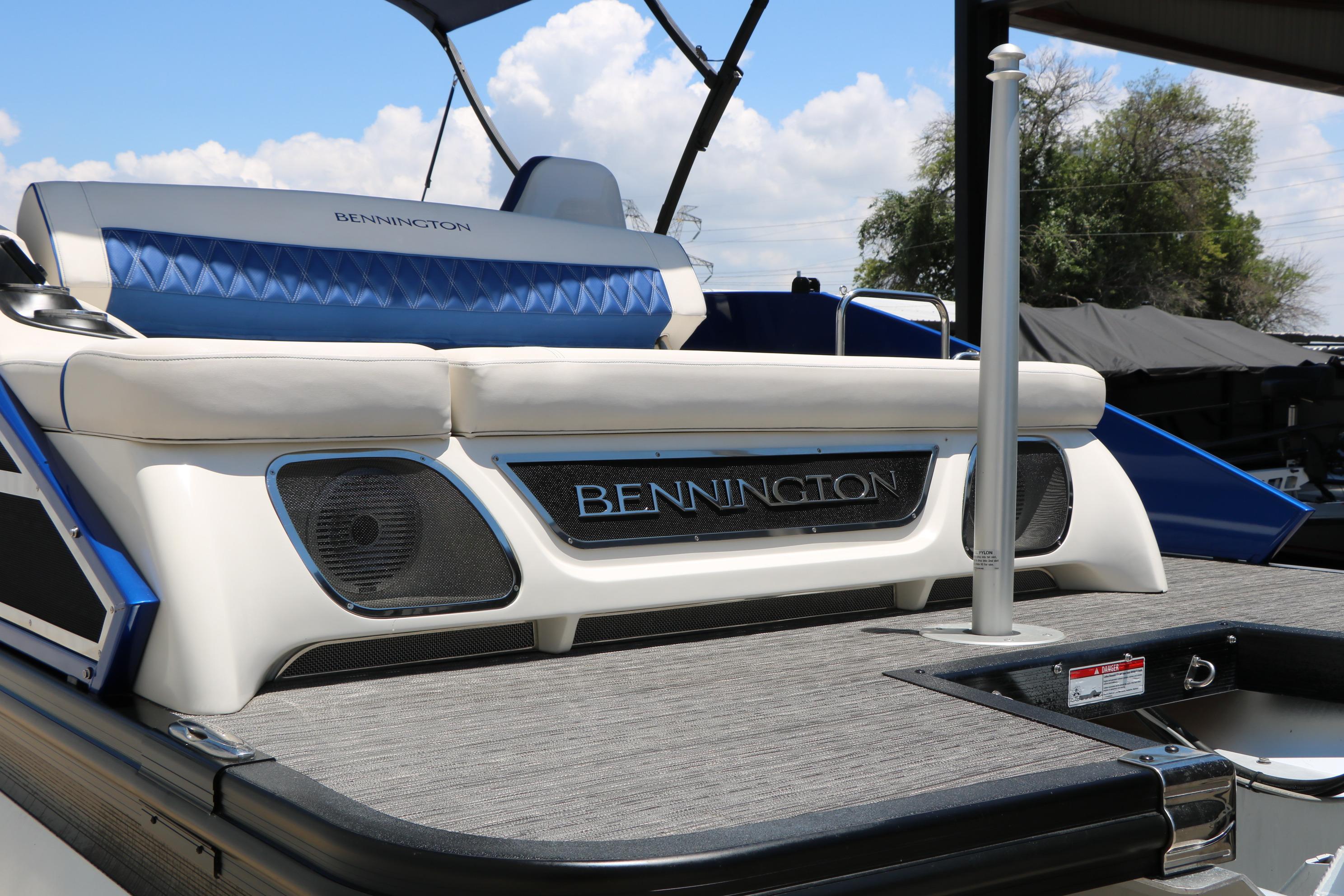 2024 Bennington 23 RX Swingback boat with stylish seating and sleek design.