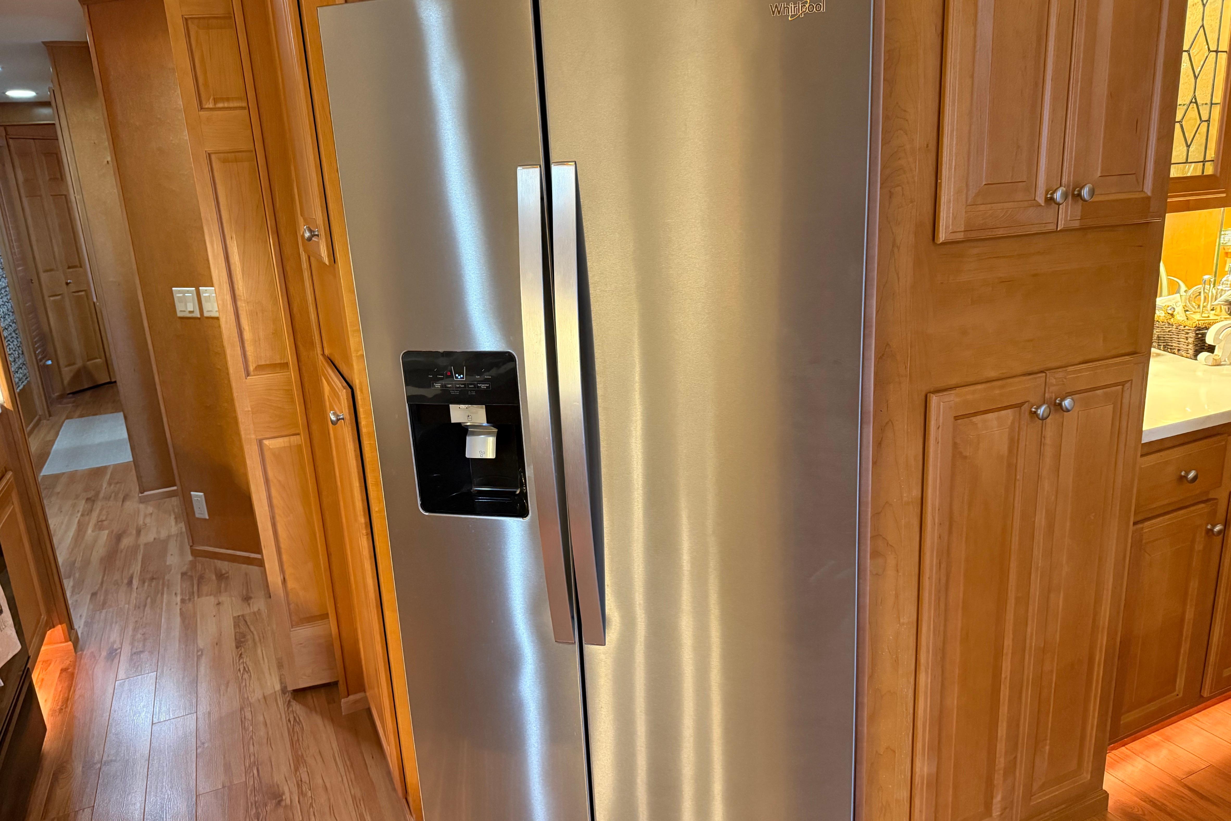 Stainless steel refrigerator in a wooden kitchen, Sharpe 80 X 18, 2001 model.
