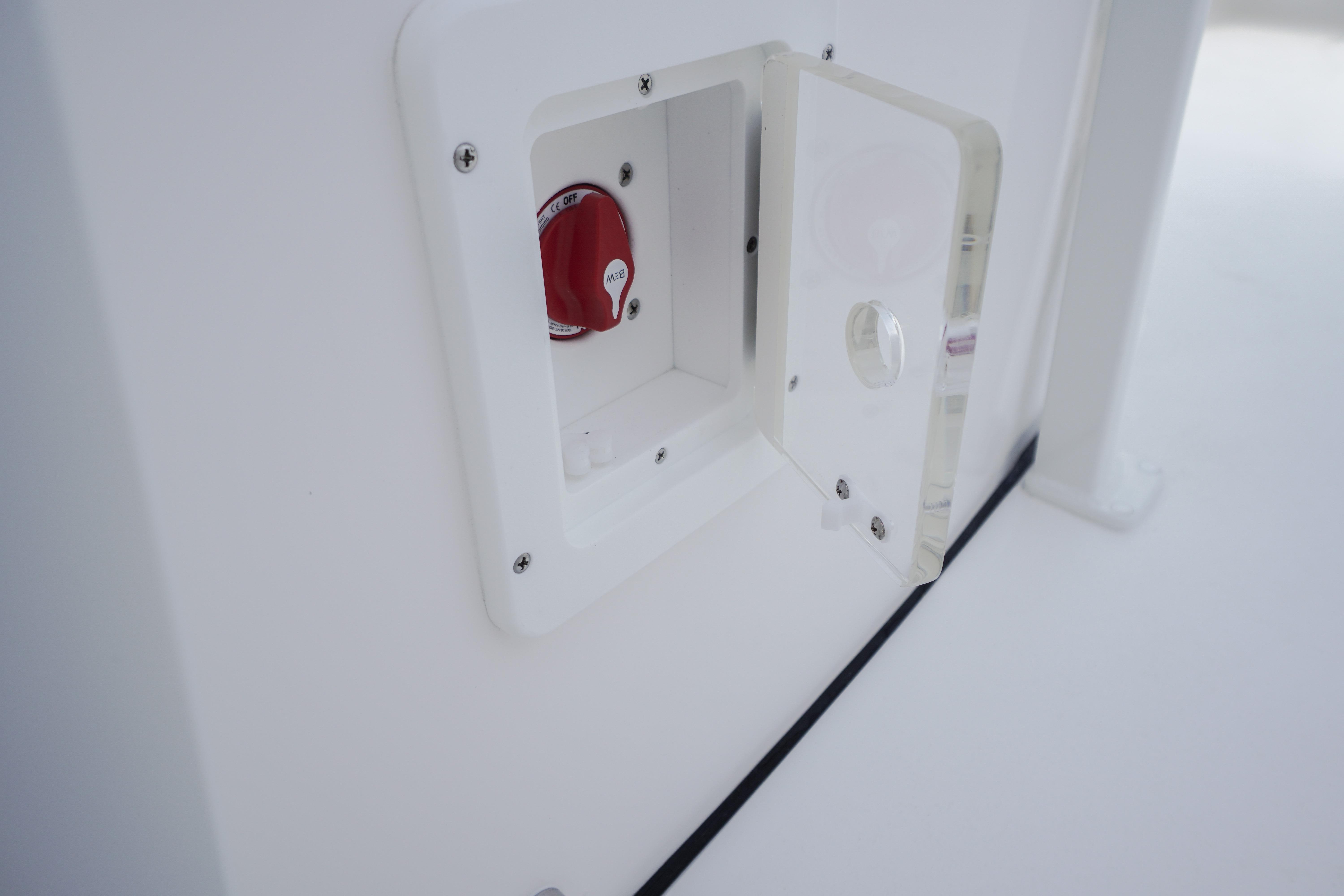 Battery switch compartment on 2027 Tidewater 220 CC Adventure boat.