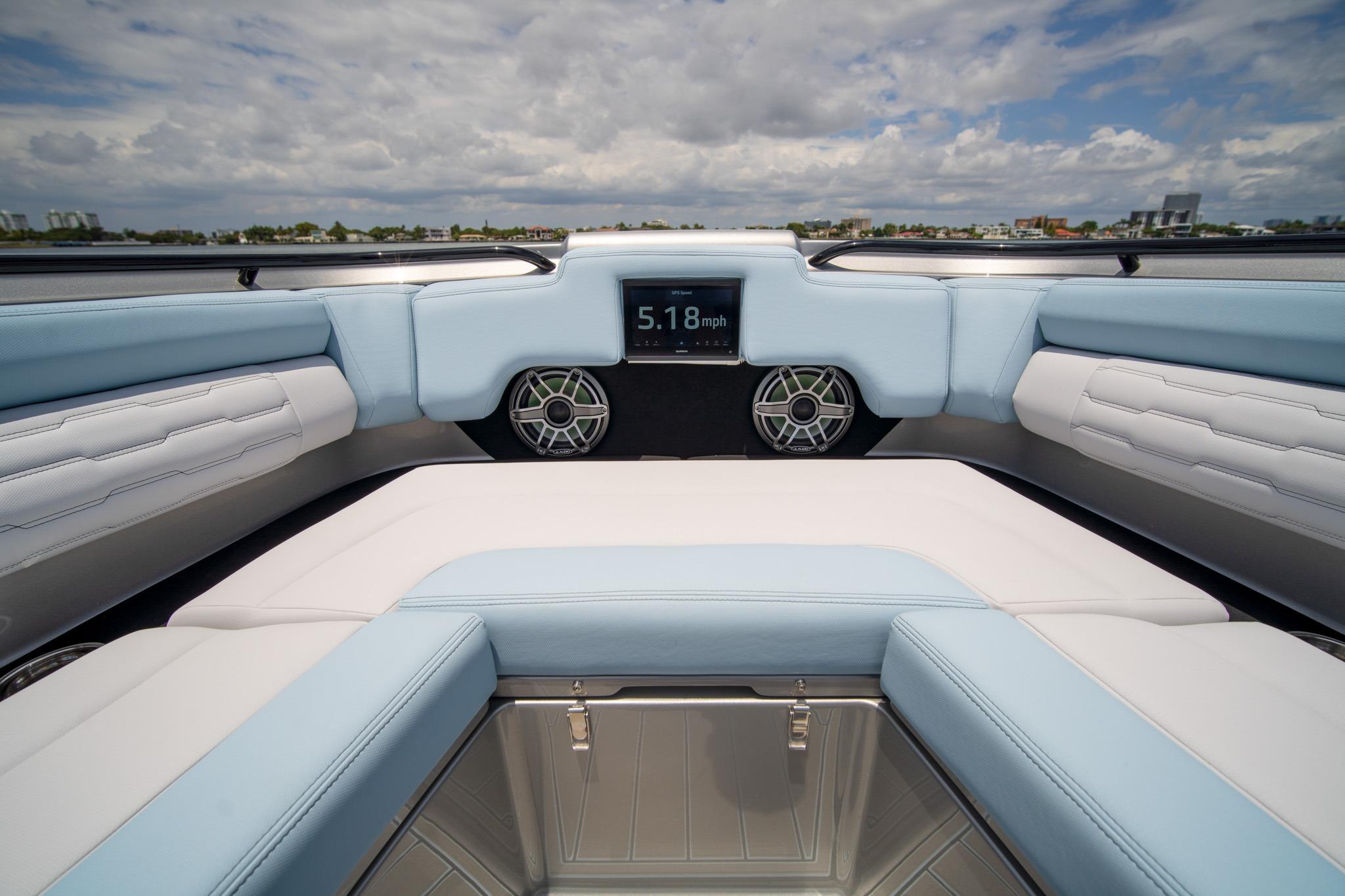 Luxurious interior of 2026 Cigarette 41' Nighthawk boat with modern dashboard and seating.