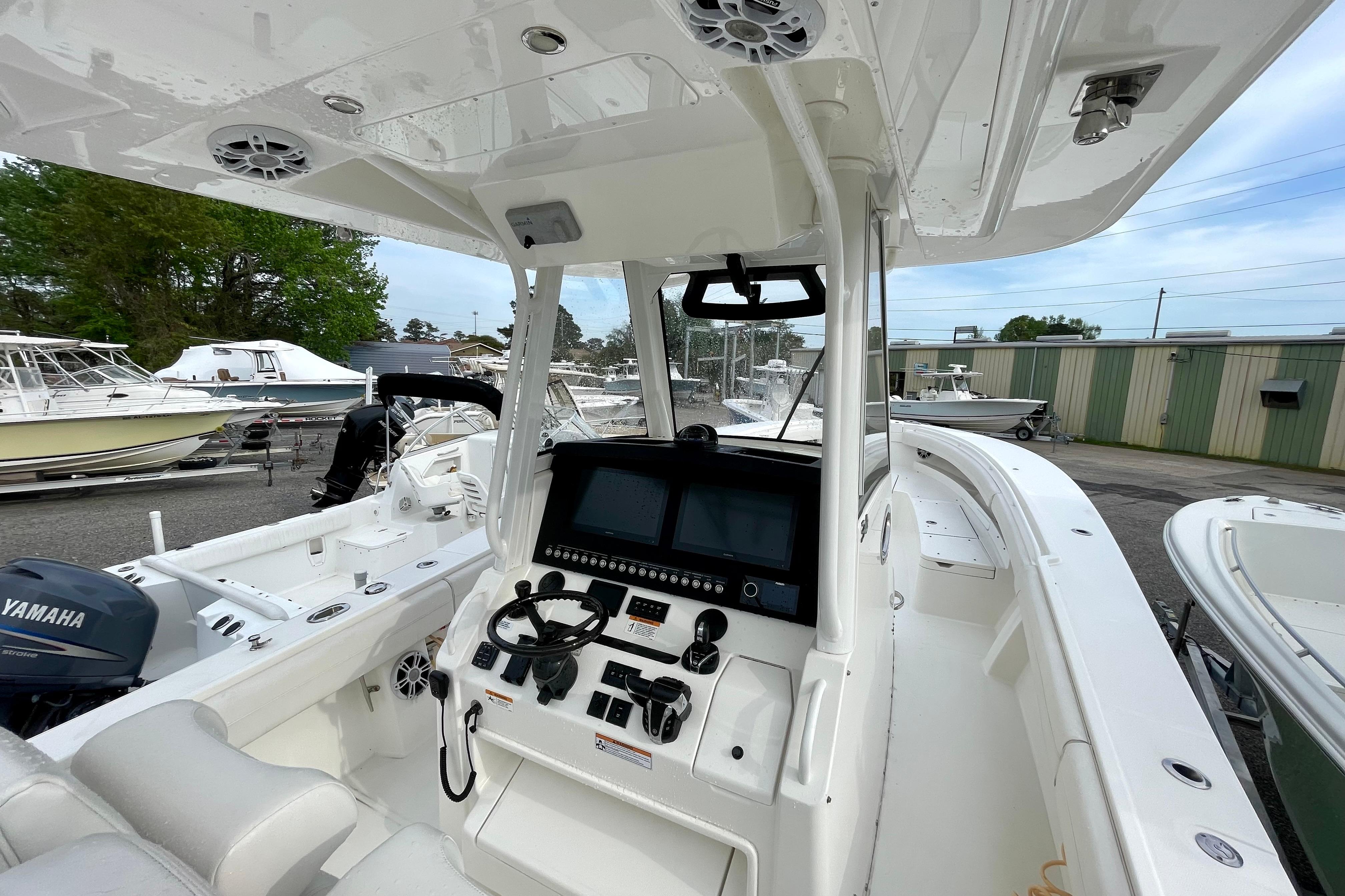 2023 Regulator 34 boat cockpit with advanced navigation system and Yamaha engine.