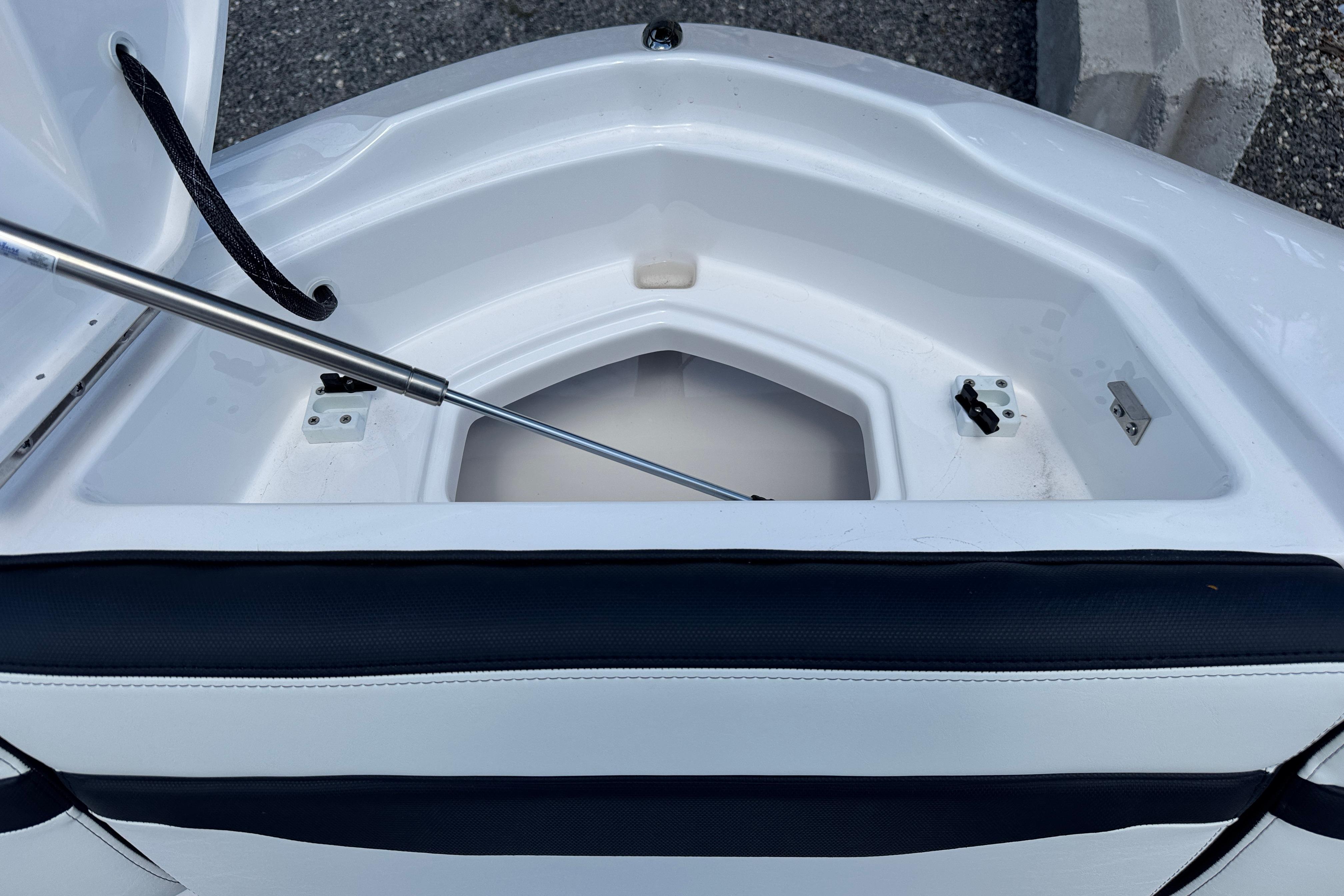 Open storage compartment in 2026 Yamaha Boats 275SD, featuring sleek design and durable materials.
