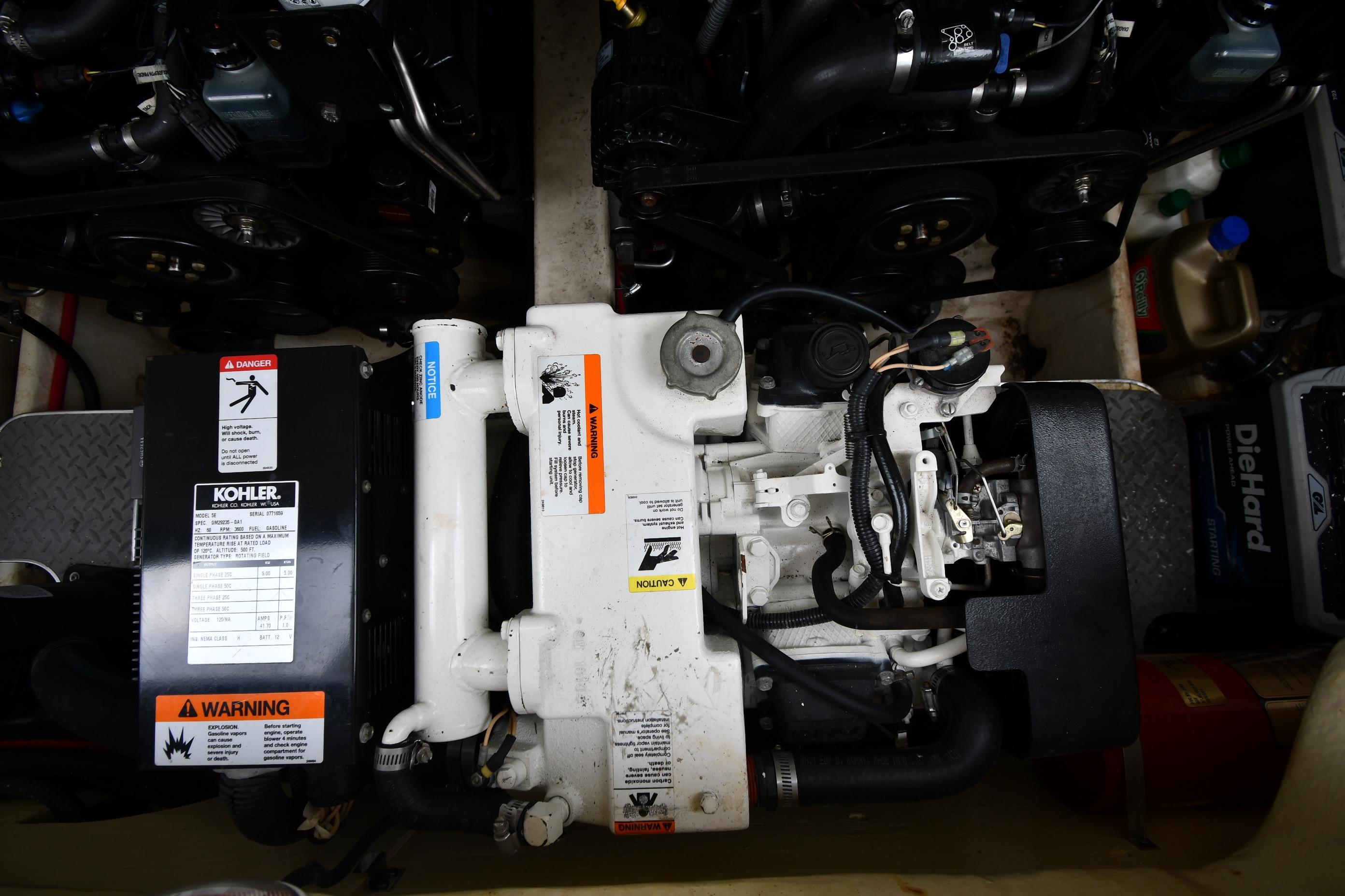 Engine compartment of a 2004 Formula 330 Sun Sport boat with Kohler generator.