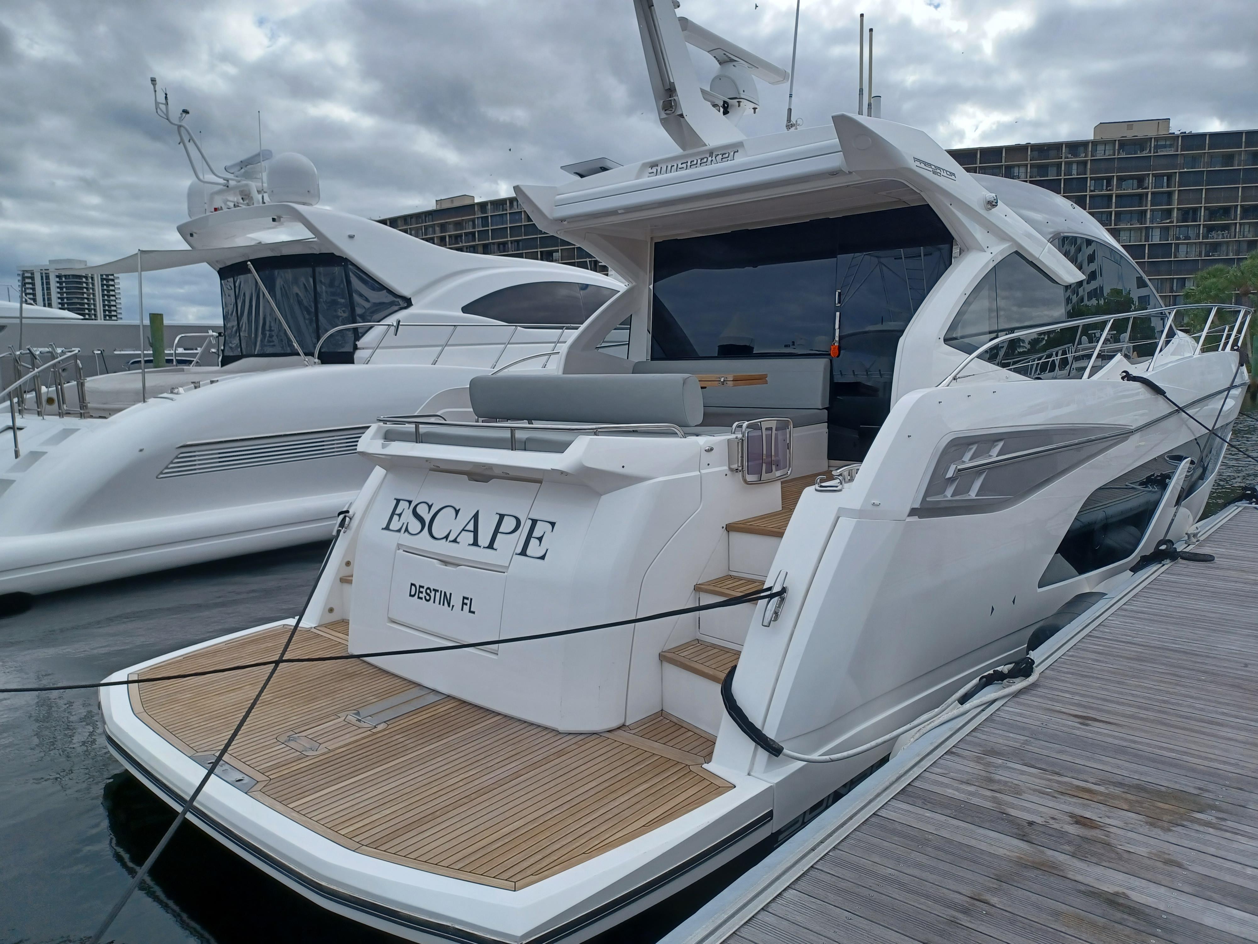 2020 Sunseeker Predator 50 yacht docked, featuring sleek design and modern amenities.