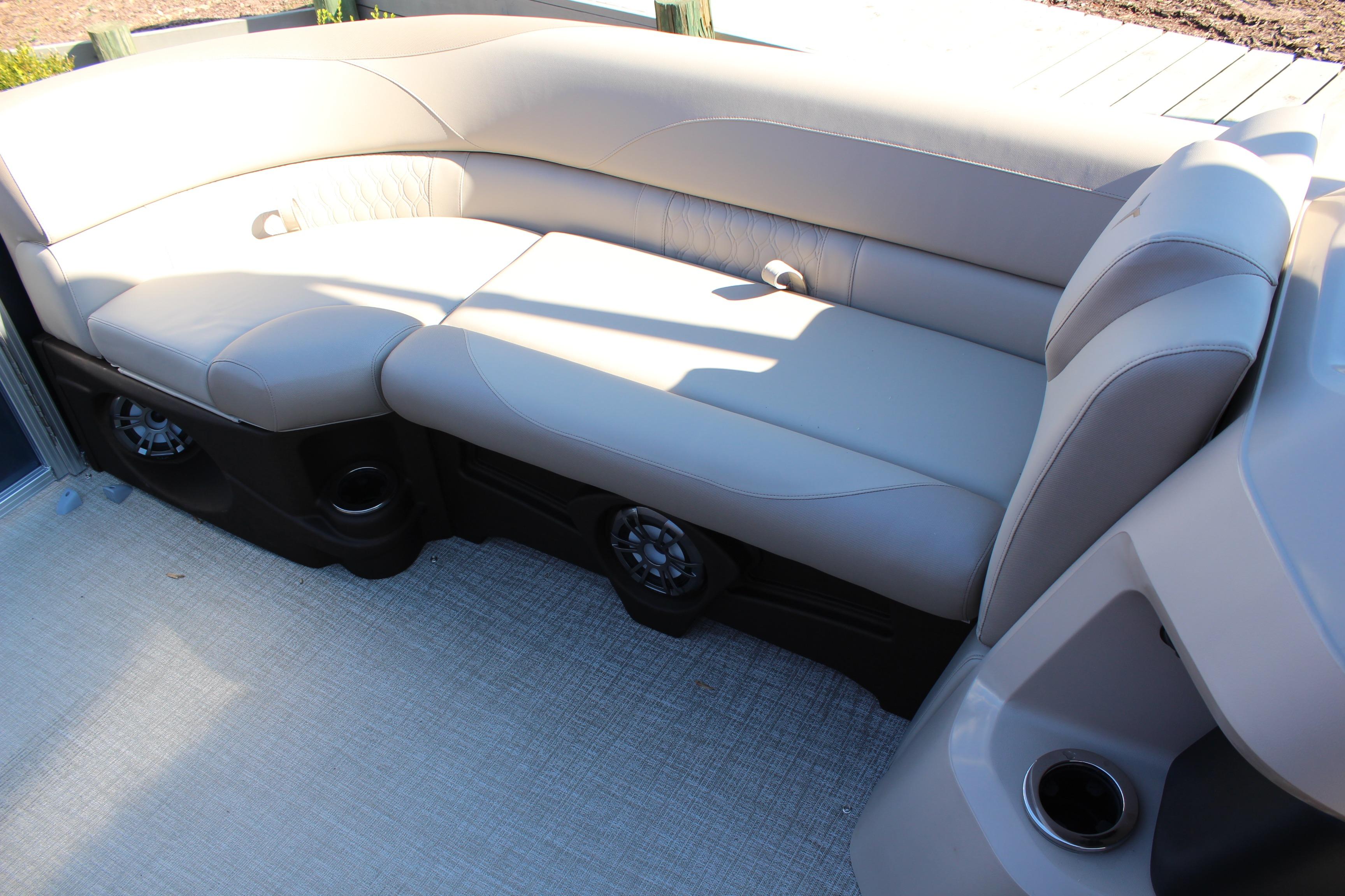 2026 Tahoe Pontoon LTZ Elite interior with luxurious seating and integrated speakers.