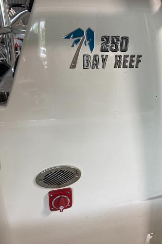 2024 Key West 250 Bay Reef boat exterior with logo and vent.
