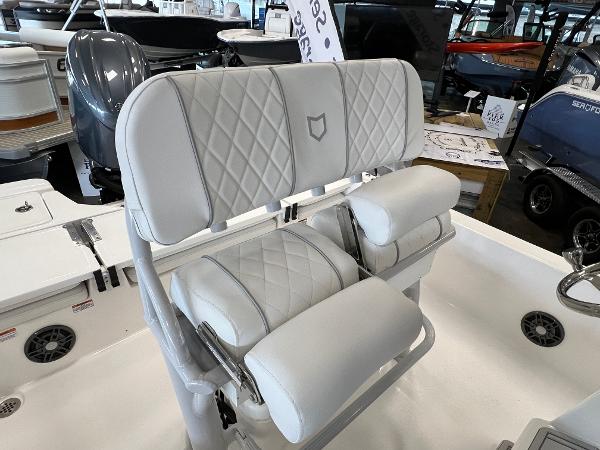 2024 Sea Fox 231 Bay boat with cushioned seating and diamond-stitched upholstery.