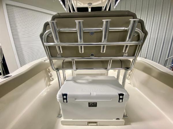 2024 Key West 219 FS boat interior with cooler and rod holders.
