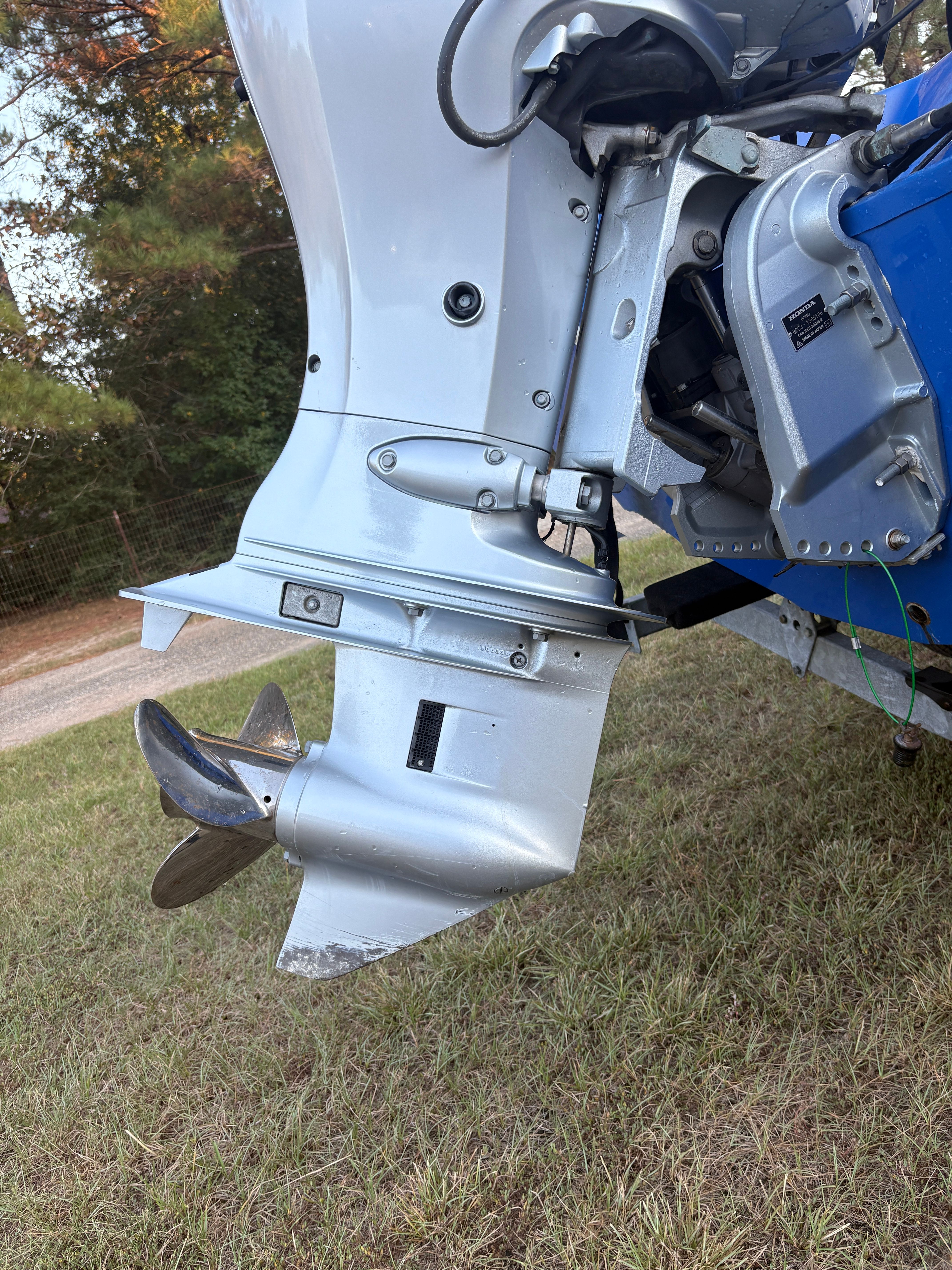 Revel T2 2017 outboard motor on grass surface.