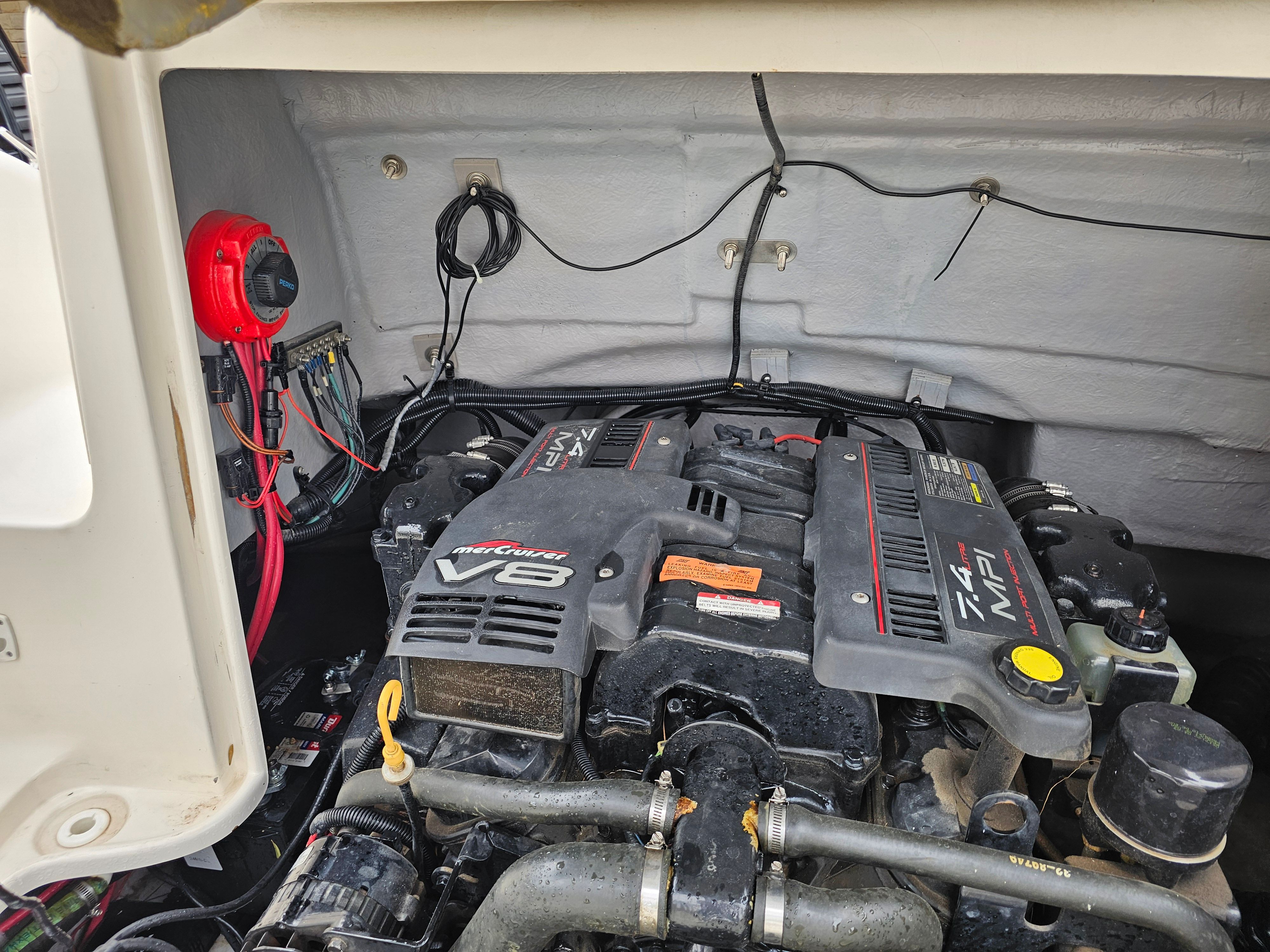 Engine compartment of a 1998 Chaparral Sunesta 252 Special Edition boat.
