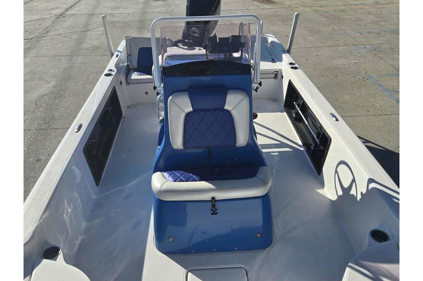 2020 Blue Wave 2400 PureBay boat interior with blue and white seating.