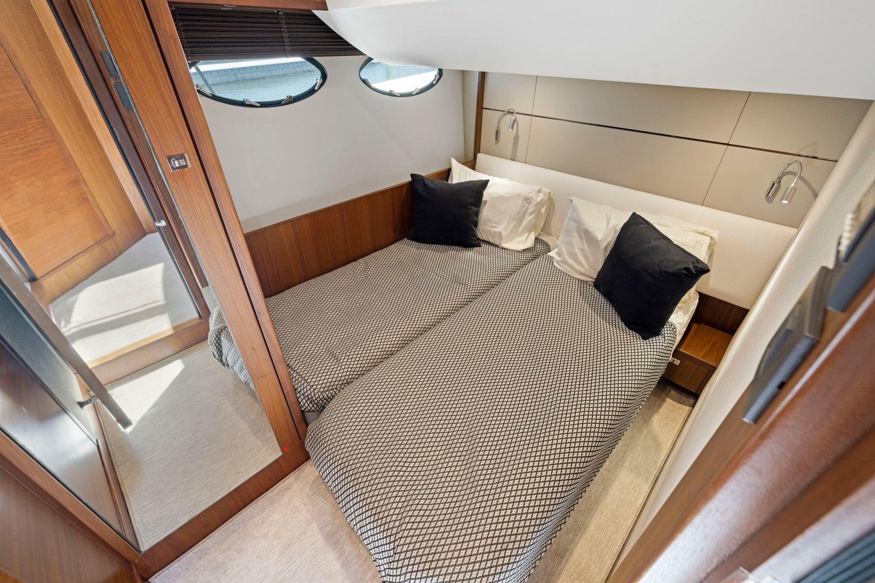 Luxurious twin cabin interior on 2015 Princess 60 Flybridge Motor Yacht.
