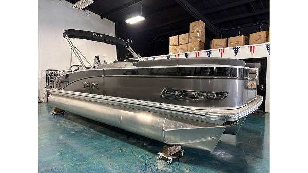 2025 Tahoe Pontoon Cascade Cruise Rear Bench in showroom, sleek design, metallic finish.