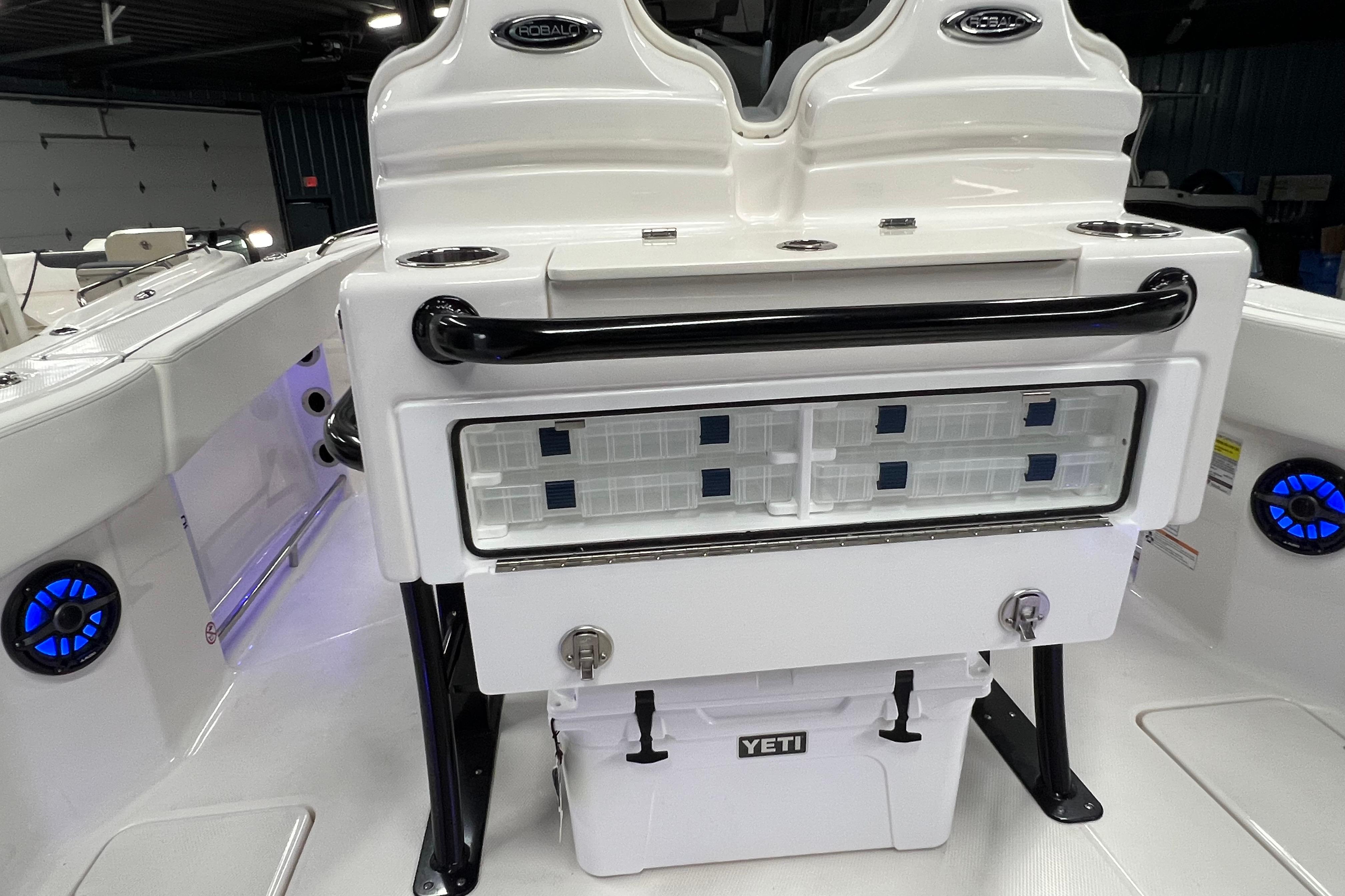 2025 Robalo R250 Center Console boat interior with storage and Yeti cooler.