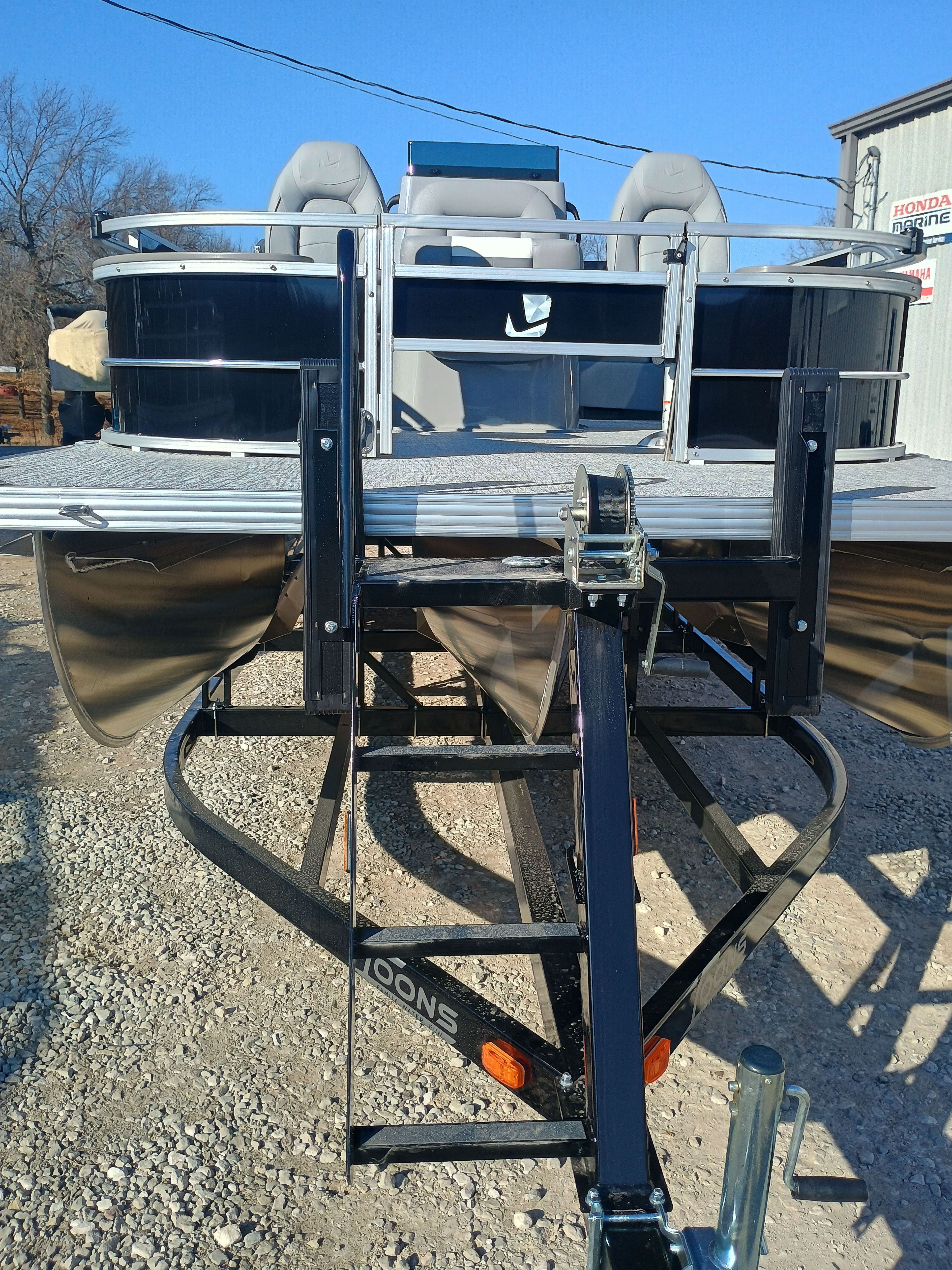 2026 Landau Alure 25CC Fish-Black on trailer, front view.