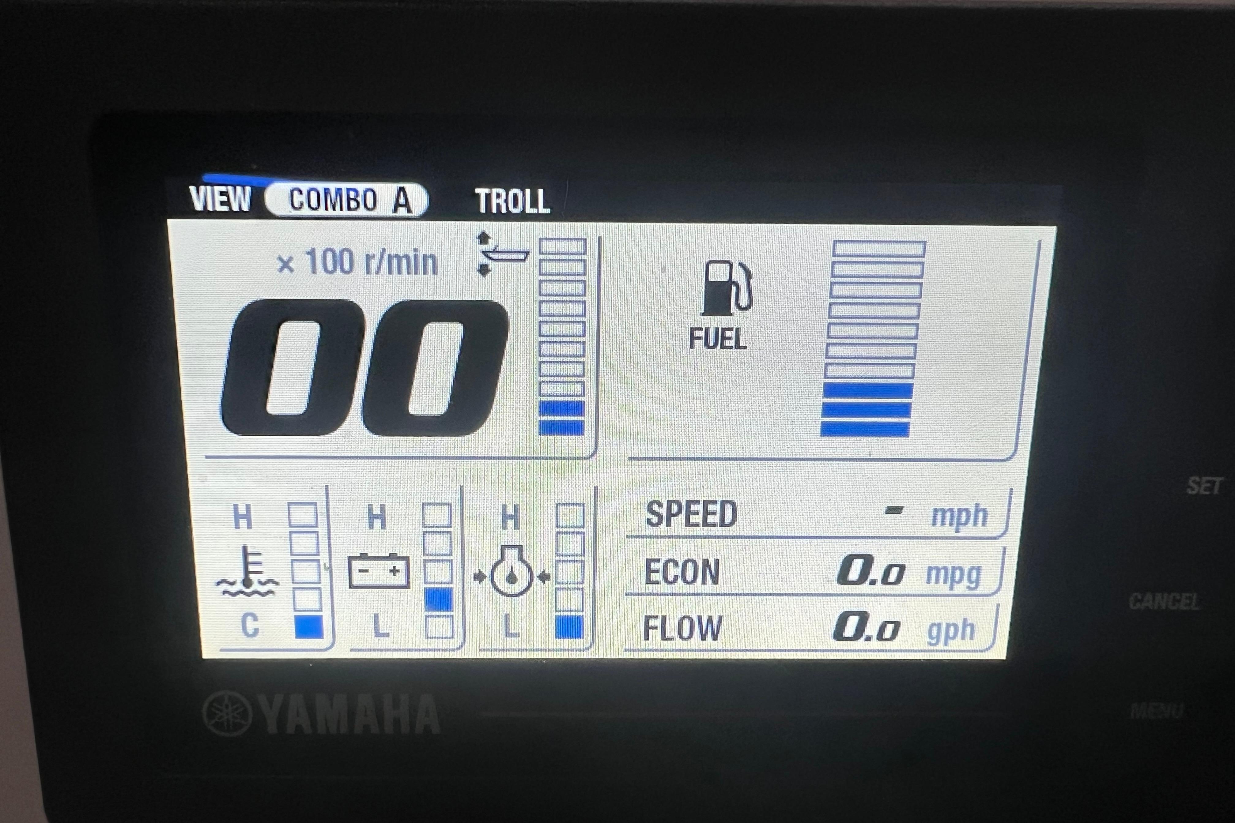 Yamaha display panel on 2018 Cobia 201 Center Console boat showing fuel and engine metrics.