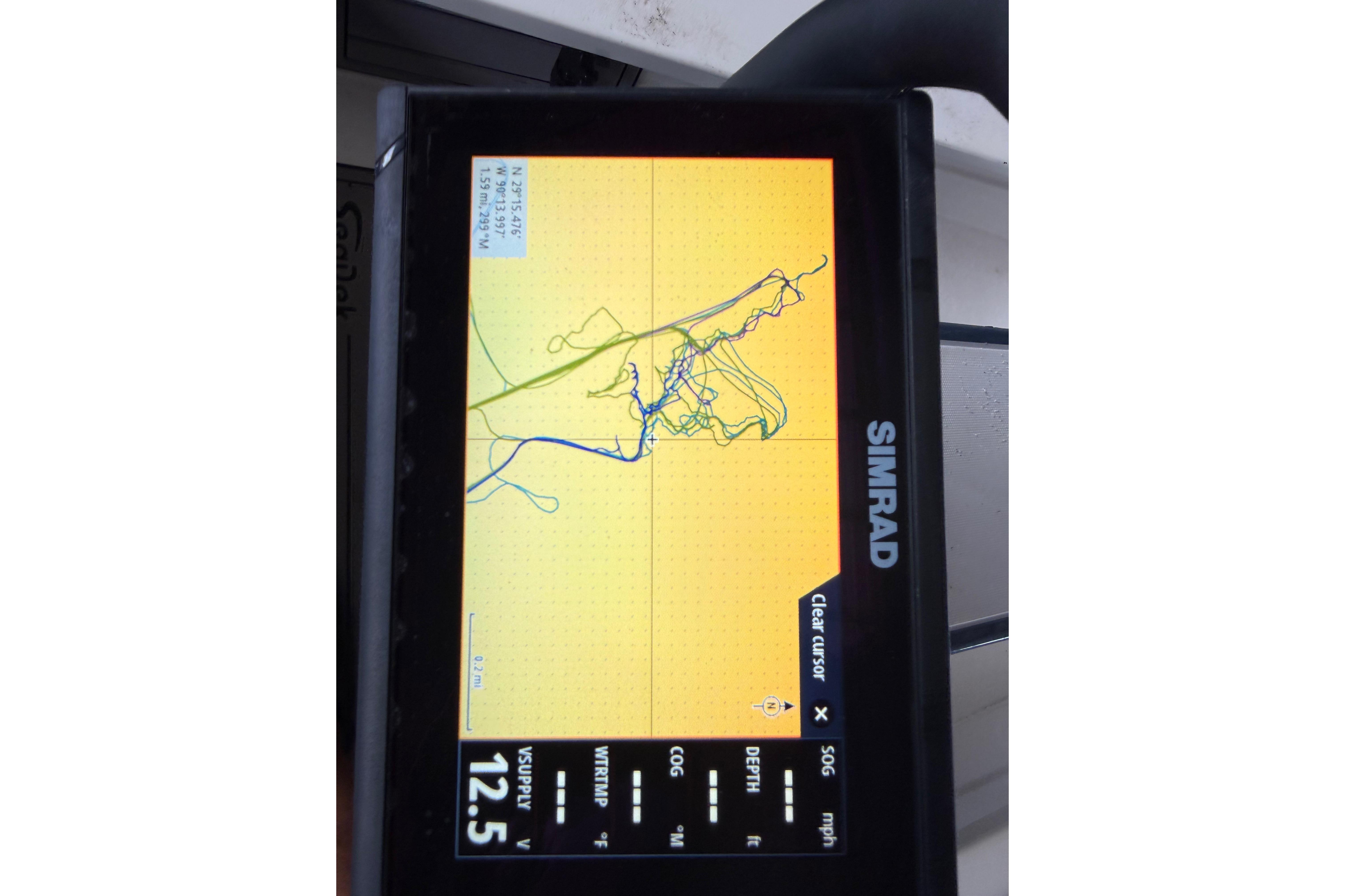 Simrad GPS display showing navigation route on Skimmer Skiff 14, 2020 model.