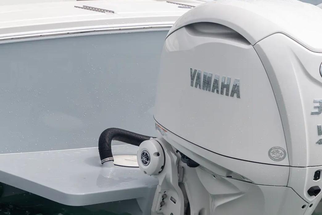 2026 Regulator 28 boat with Yamaha outboard motor in close-up view.