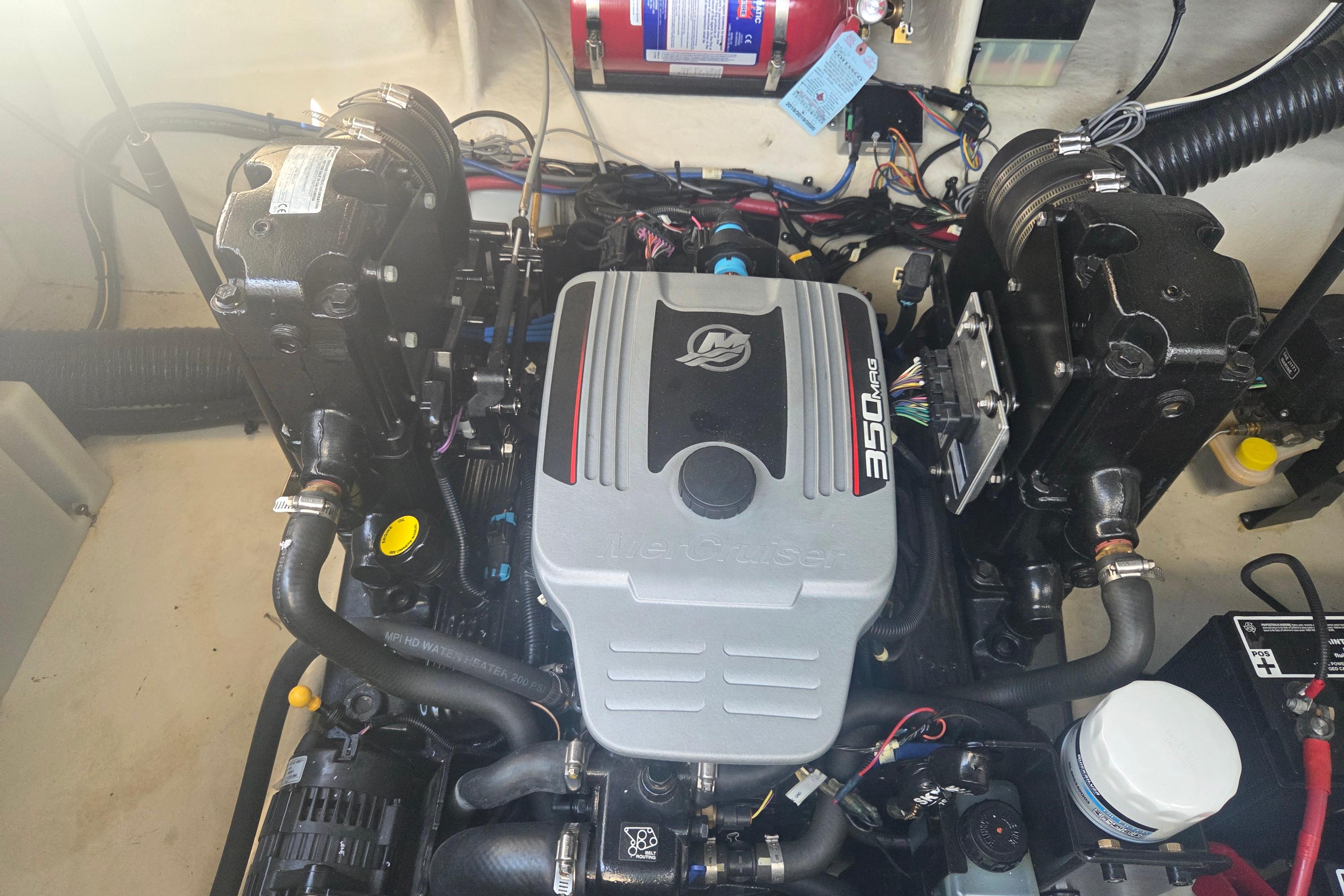 Engine compartment of a 2012 Sea Ray Sundancer 260 with MerCruiser 350 MAG engine.