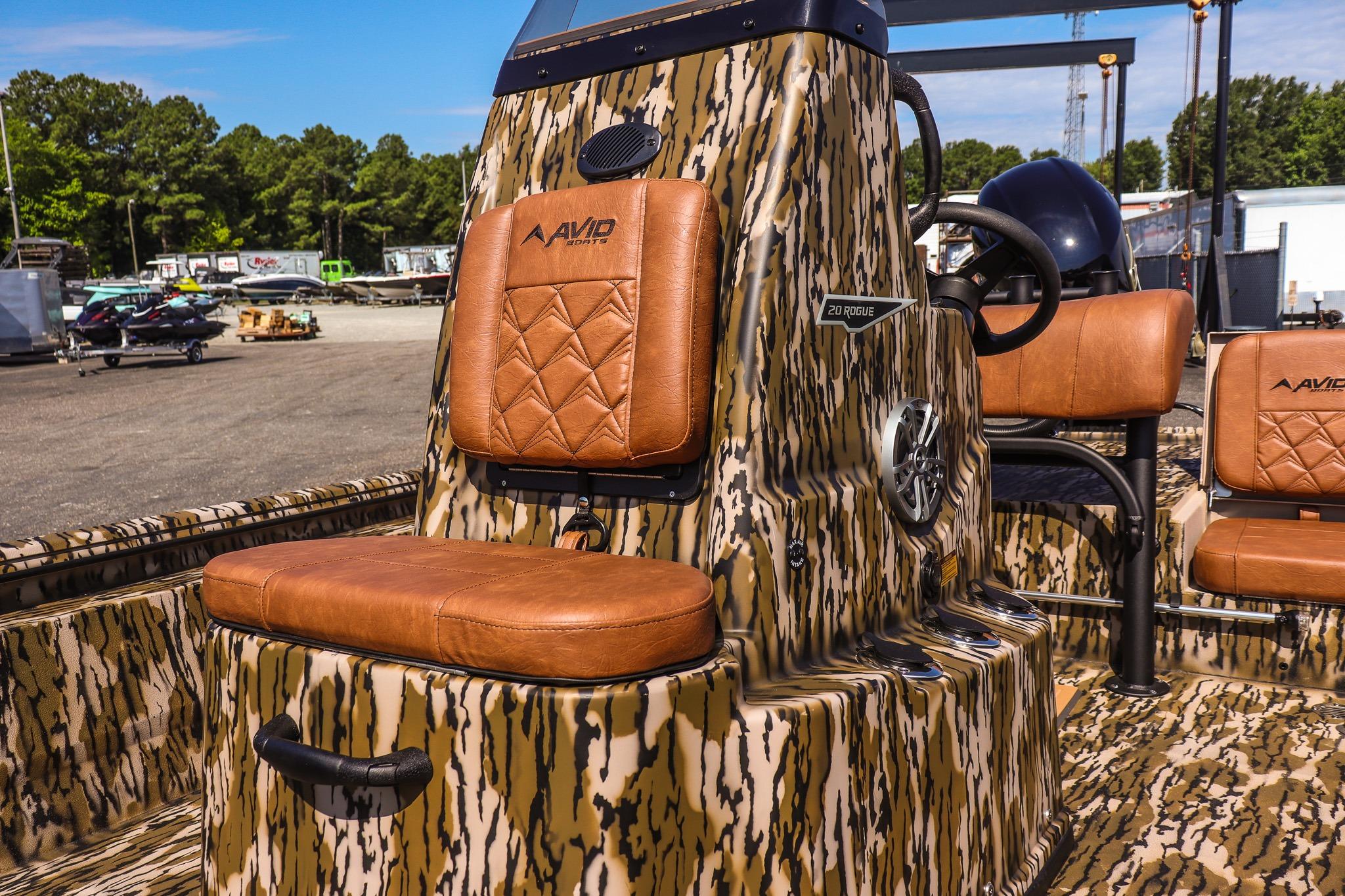 Avid 20 Rogue CC 2027 with camouflage pattern and brown leather seats.