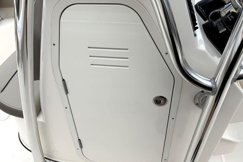 2024 Key West 239 FS boat console with sleek white finish and stainless steel accents.