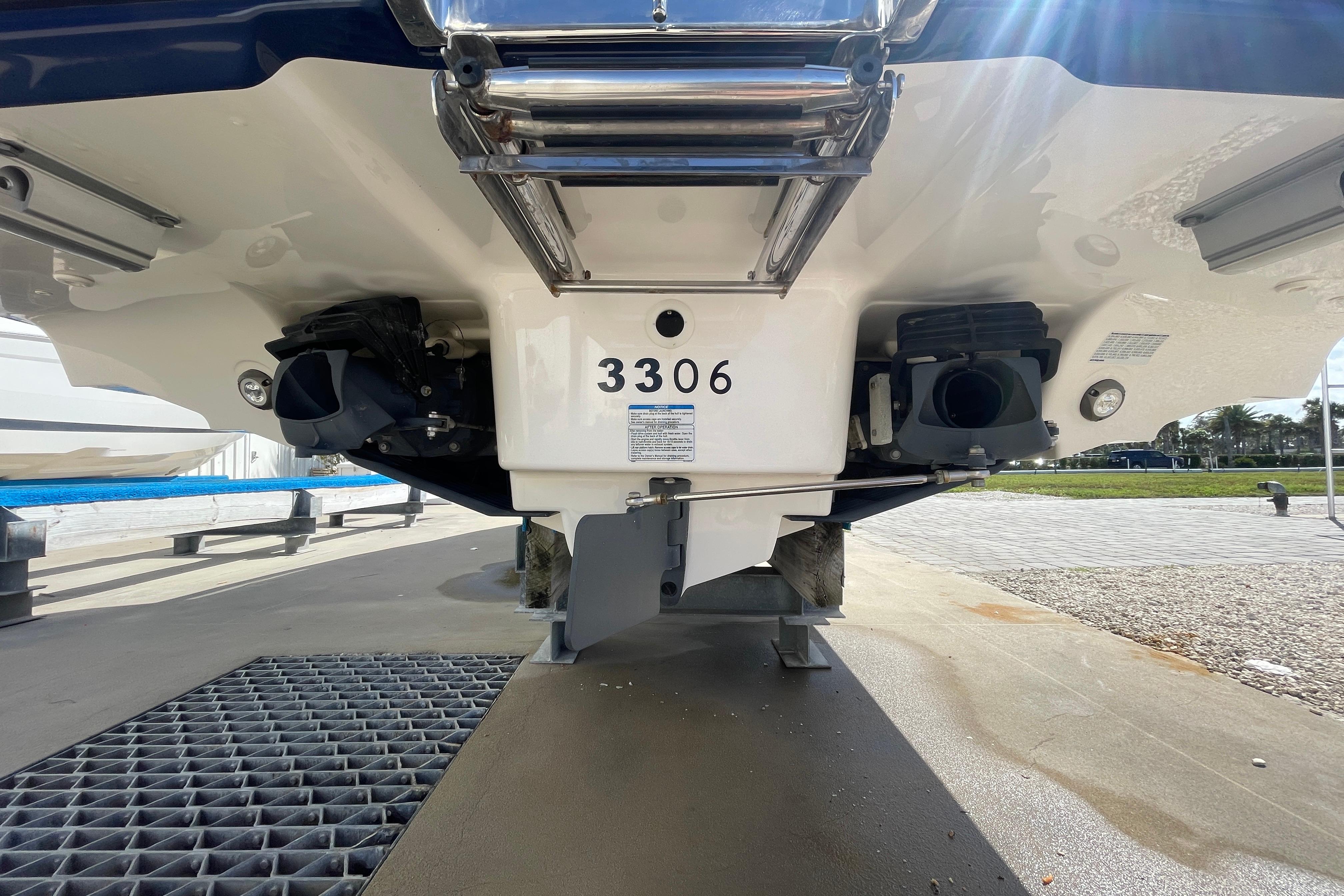 Rear view of 2021 Yamaha Boats 275SE, showcasing dual jet propulsion system.