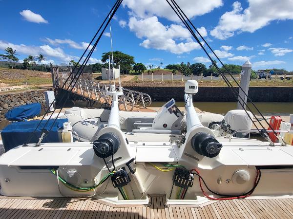Catana 65 catamaran 2009 model docked at marina with clear blue sky.