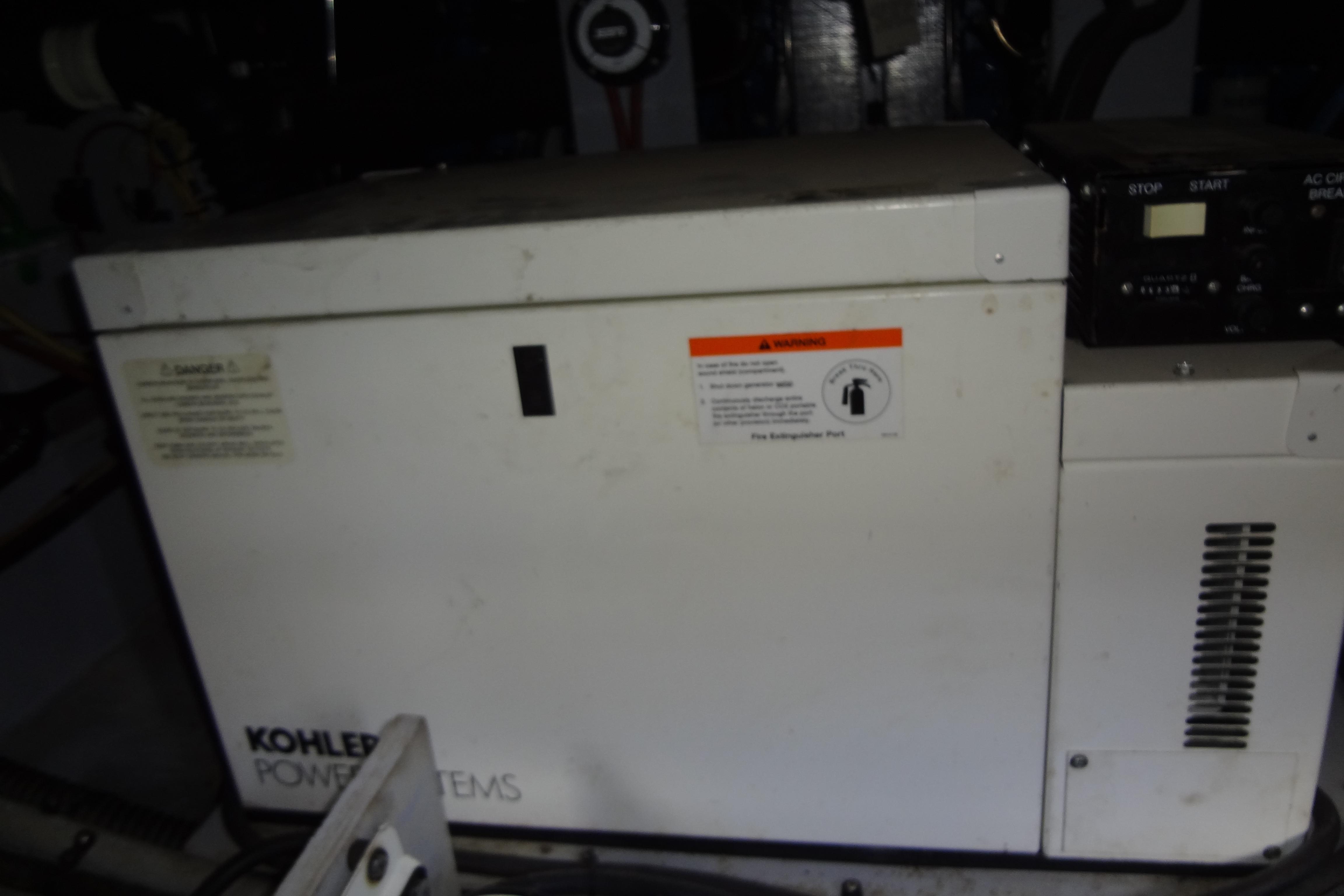 Kohler power system in 2005 Silverton 34 Convertible boat engine room.