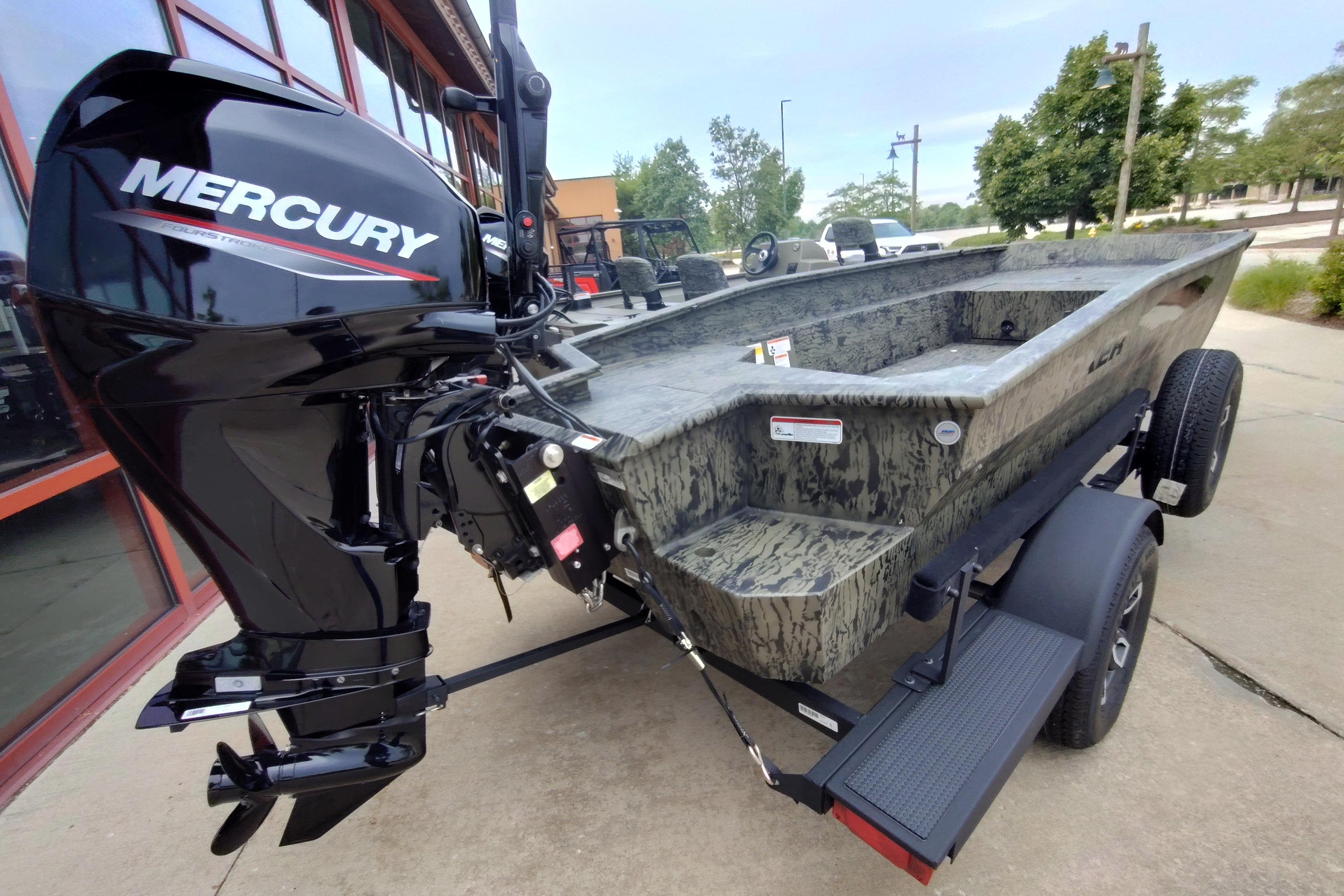 2026 Tracker Grizzly 1650 T Prairie Wings Edition boat with Mercury engine on trailer.
