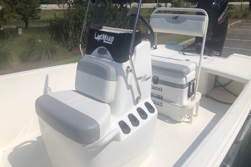 2026 Mako Pro Skiff 17 CC boat interior with seating and console.