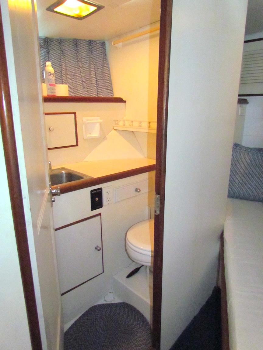 1972 Hargrave 67 Motor Yacht bathroom with compact design and essential amenities.