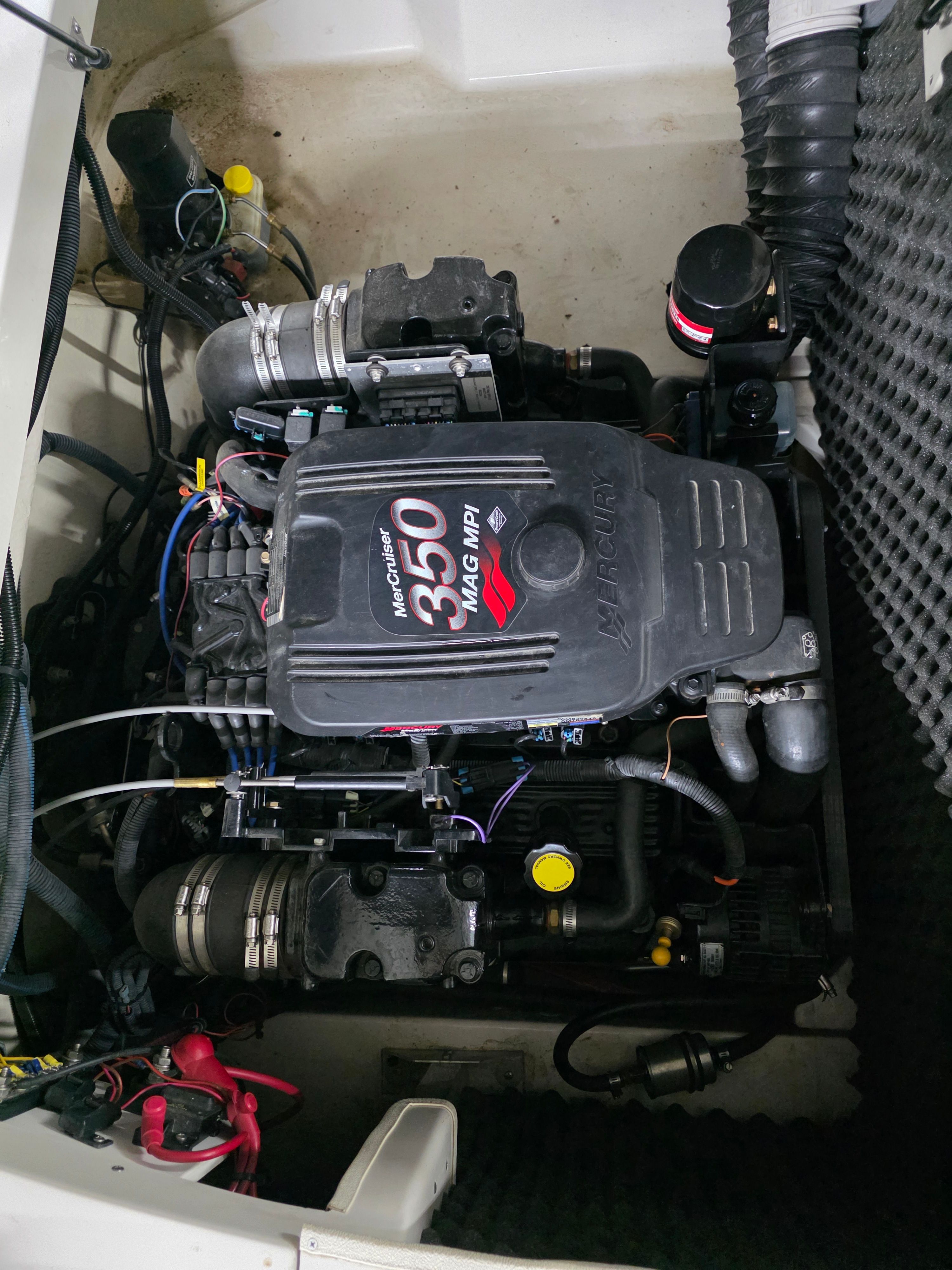 Engine compartment of a 2004 Monterey 228SI Montura Bowrider boat.