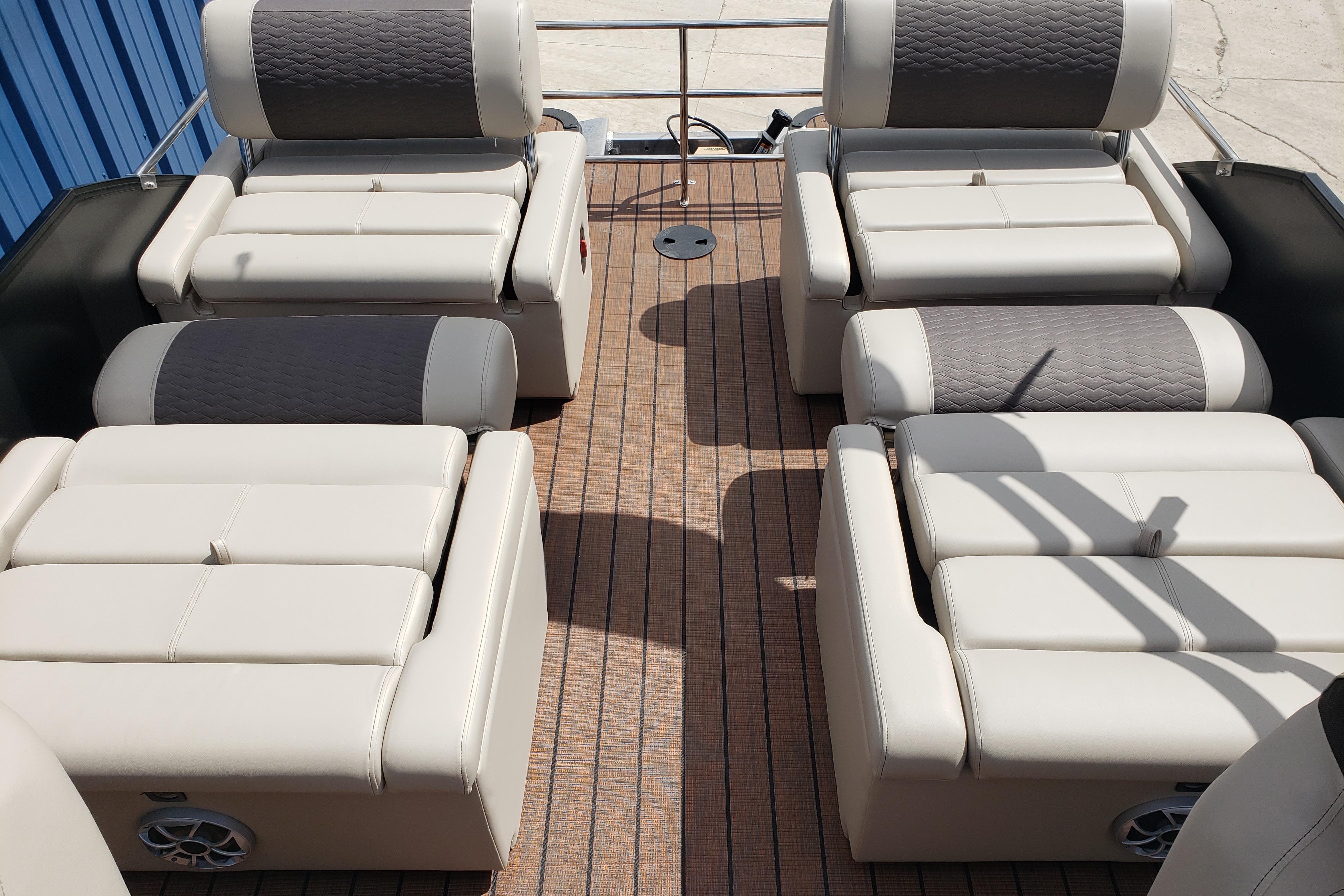 Luxurious seating on 2026 Bentley Pontoons Elite 253 QSB with elegant upholstery.
