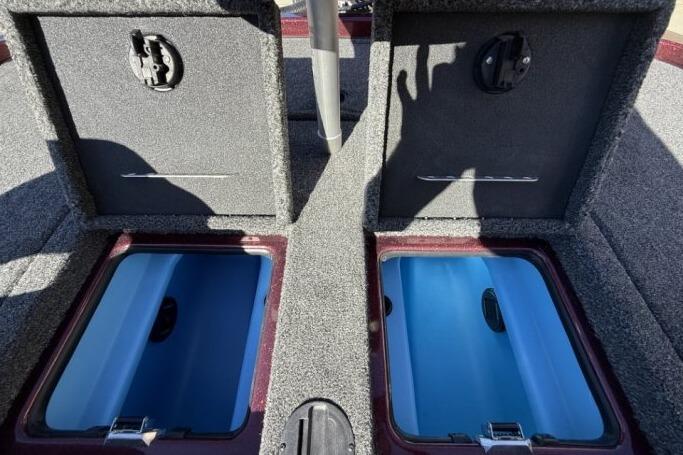 2026 Nitro Z21 XL Pro boat storage compartments with open lids, showcasing interior space.