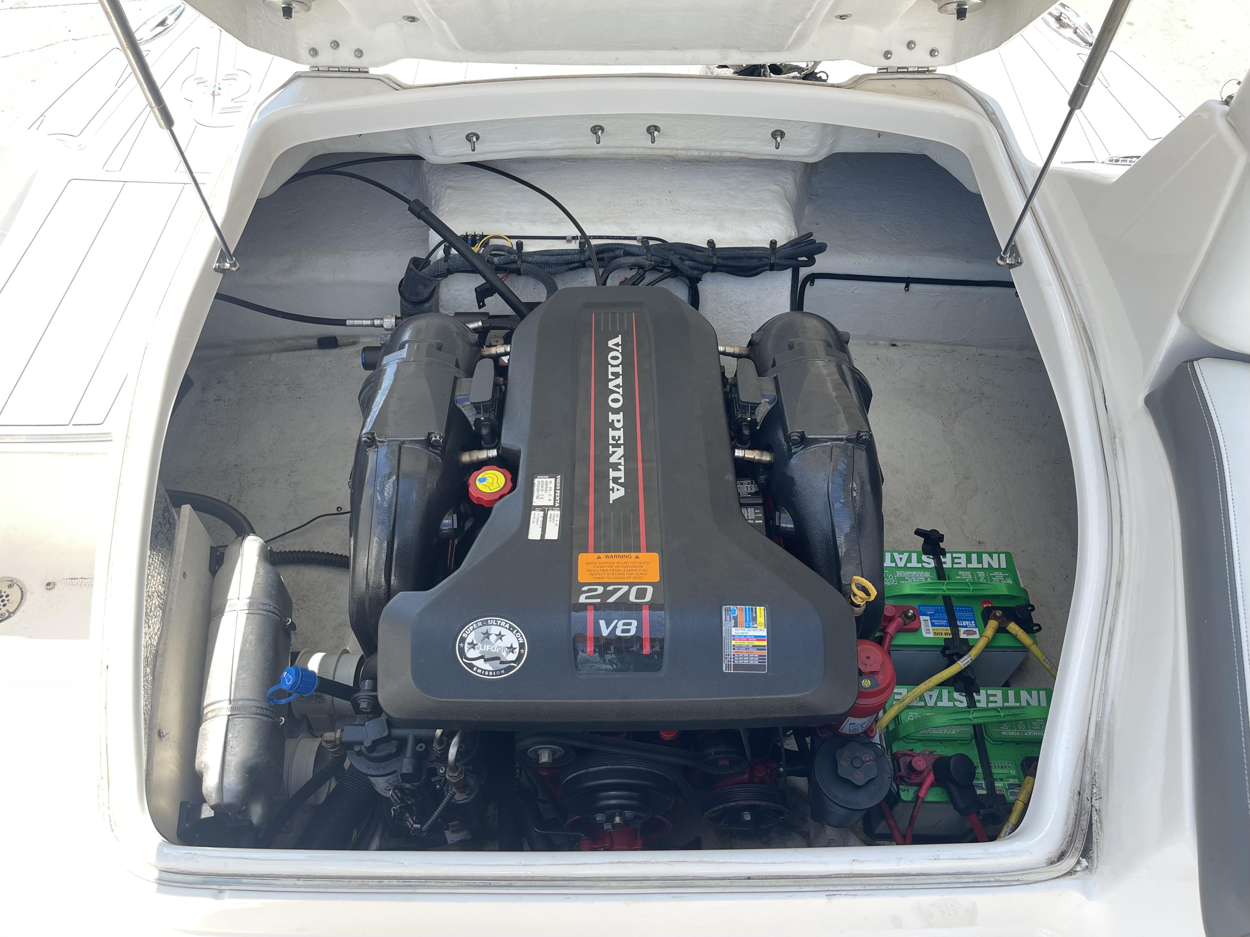 2014 Chaparral Sunesta 224 boat engine compartment with Volvo Penta V8 engine.