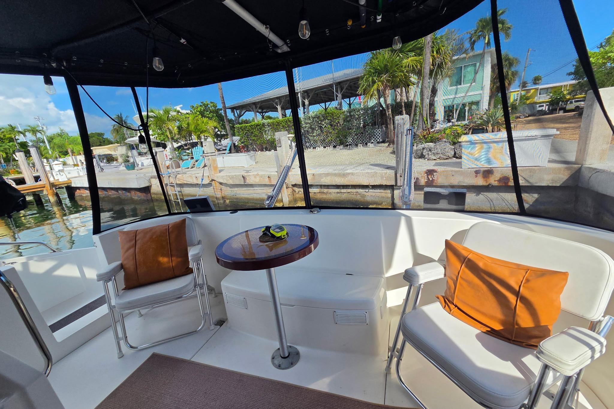 Interior of 2000 Fountaine Pajot Maryland 37 yacht with seating and table.