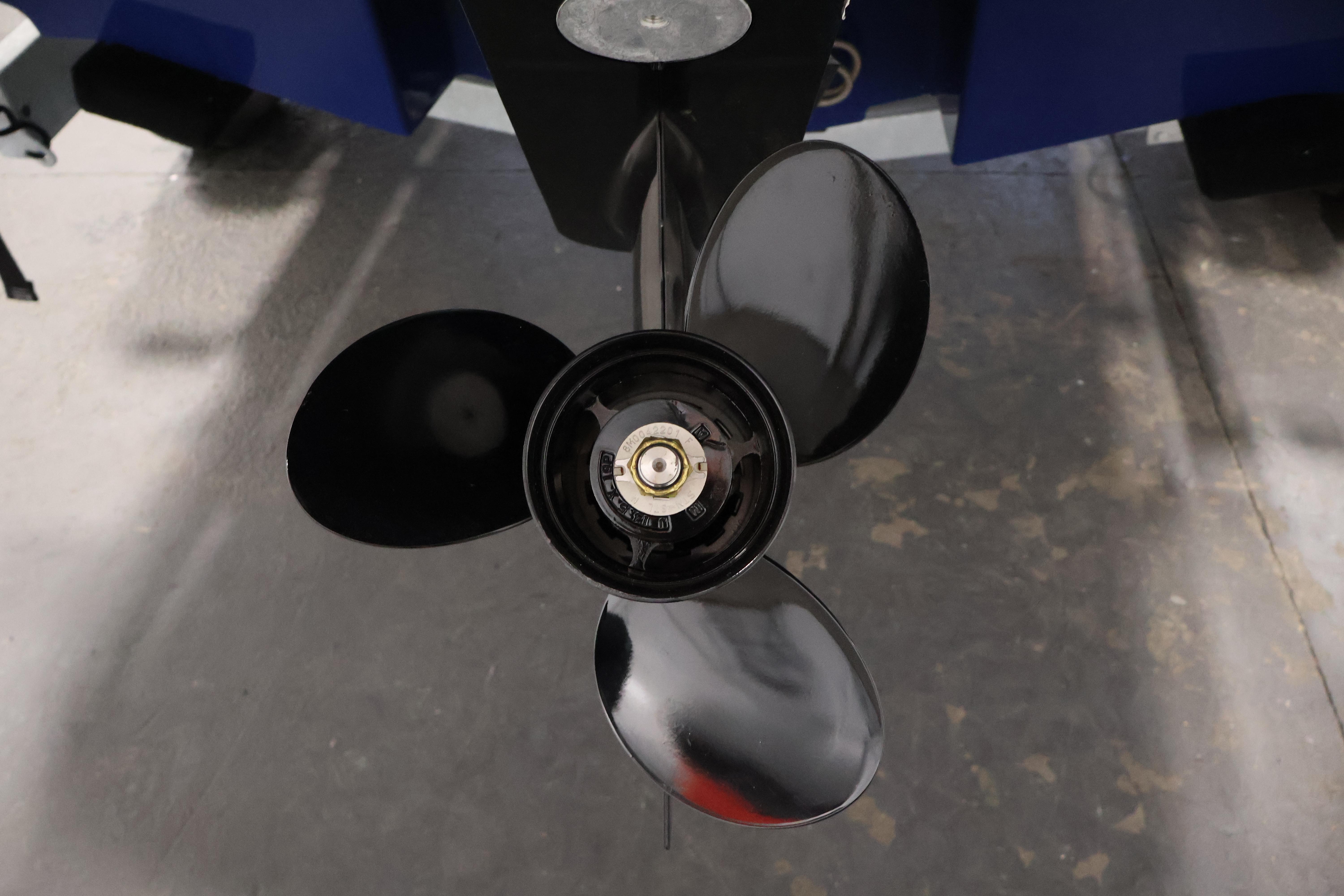 Propeller of 2026 Bayliner VR6 Bowrider I/O boat, close-up view.