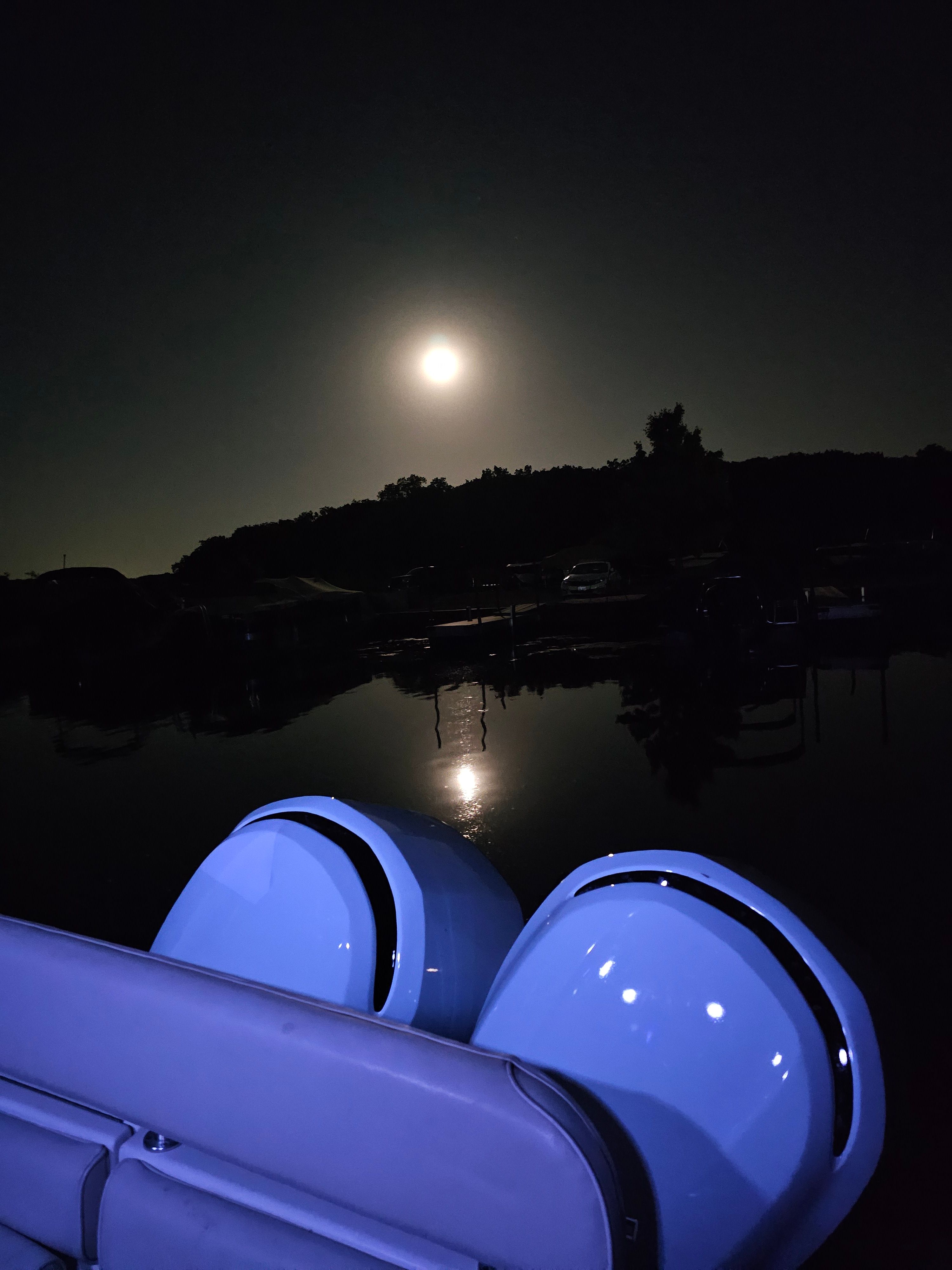 2005 Robalo R265 Walkaround under moonlight on calm water.