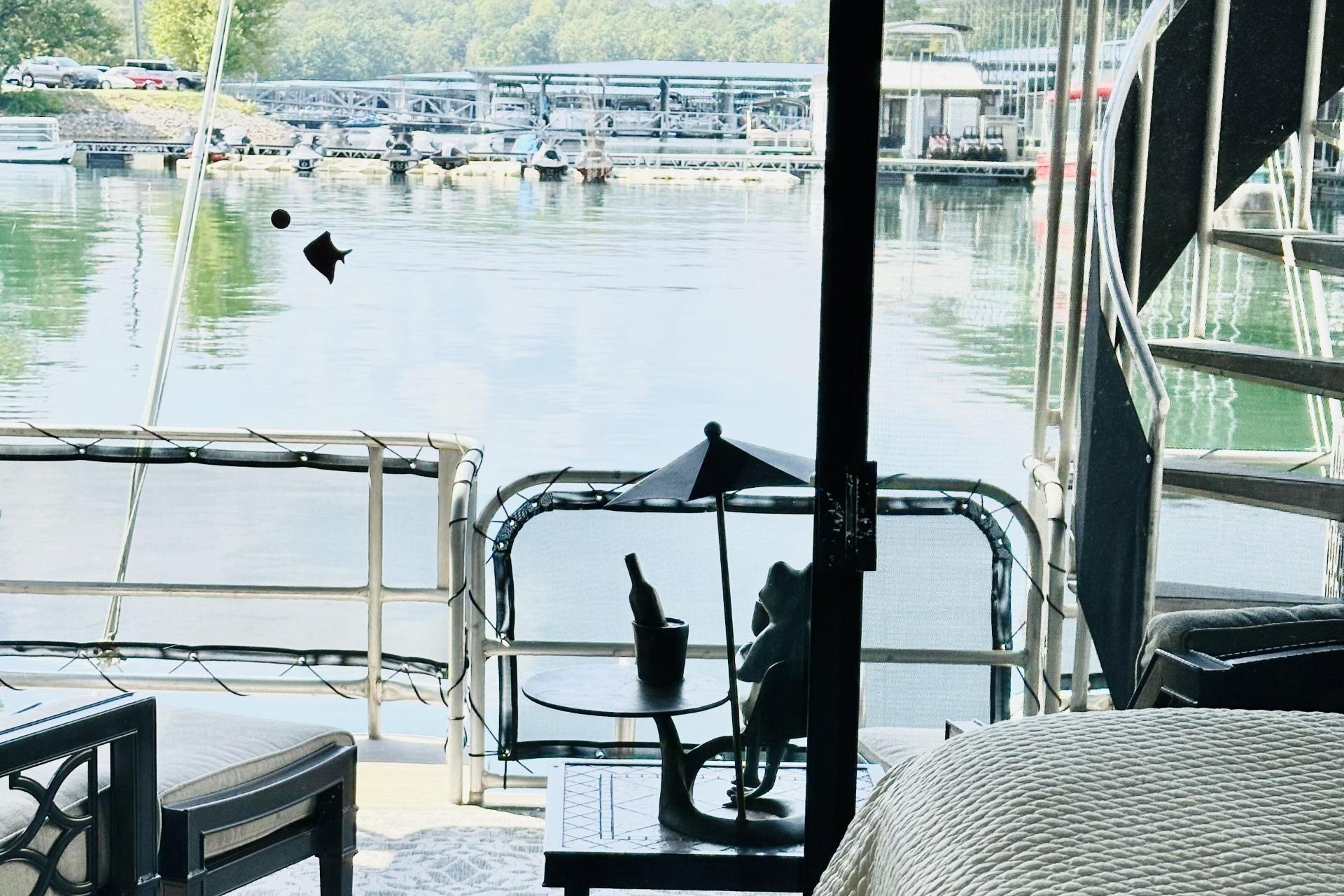 Houseboat interior view with lake, featuring Sumerset 66, 1992 model.