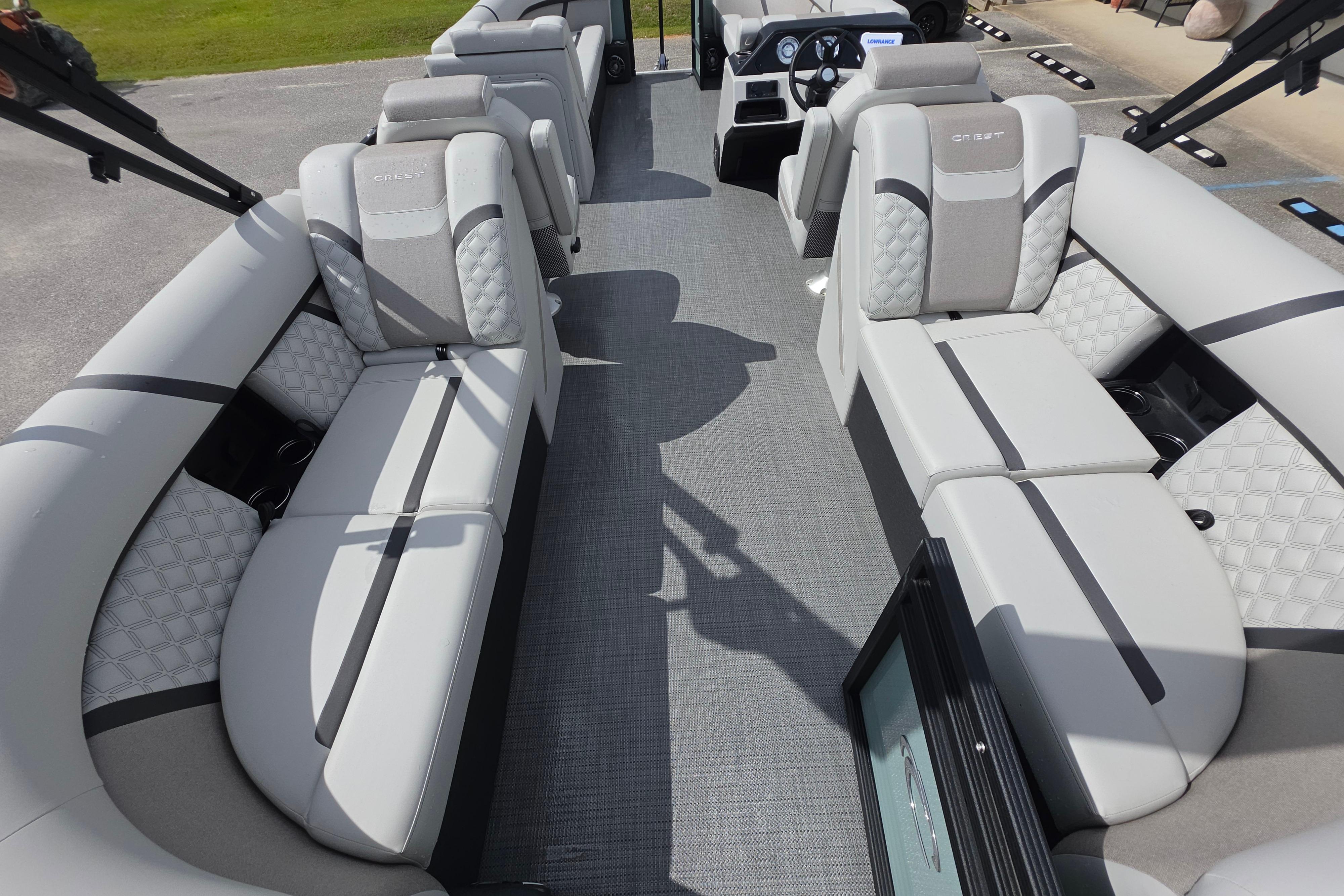 2026 Crest 235 Conquest SLC boat interior with luxurious seating and modern design.