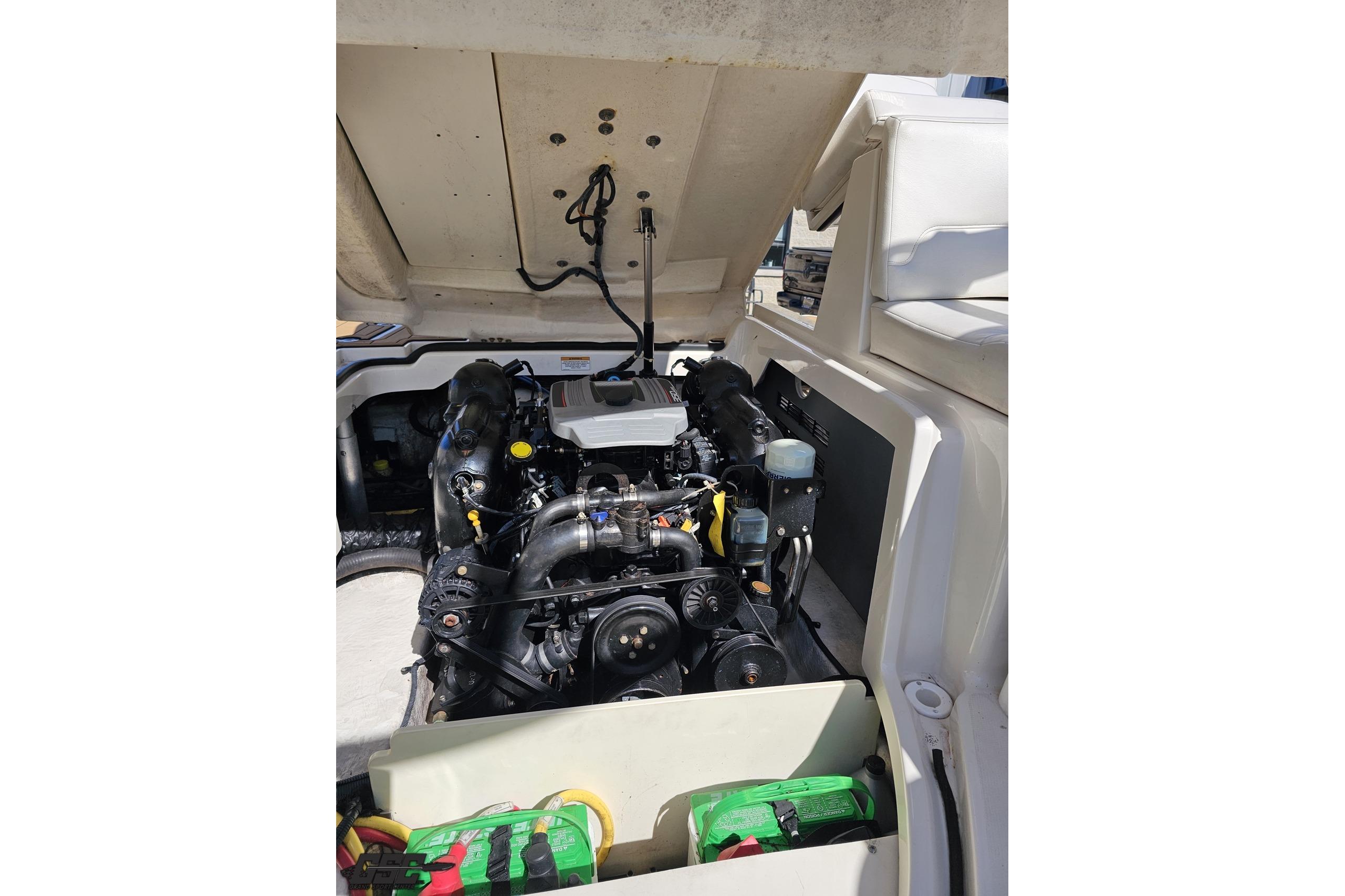 Engine compartment of a 2013 Monterey M3 Sport Boat with open hatch.