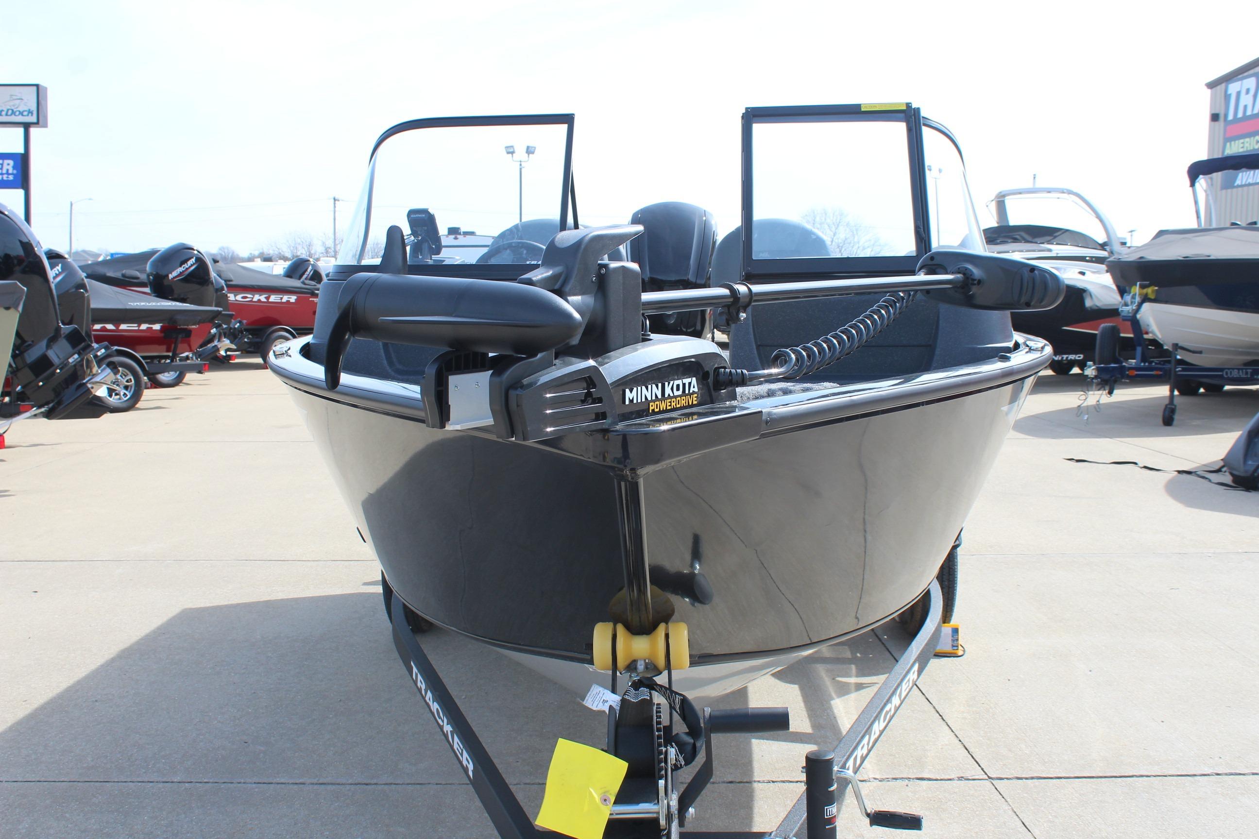 2026 Tracker Pro Guide V-16 WT boat with Minn Kota motor on trailer.