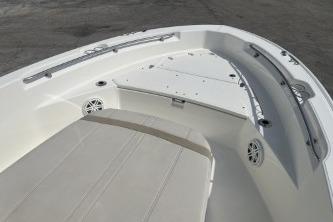 2024 Boston Whaler 220 Dauntless boat interior with seating and storage compartments.