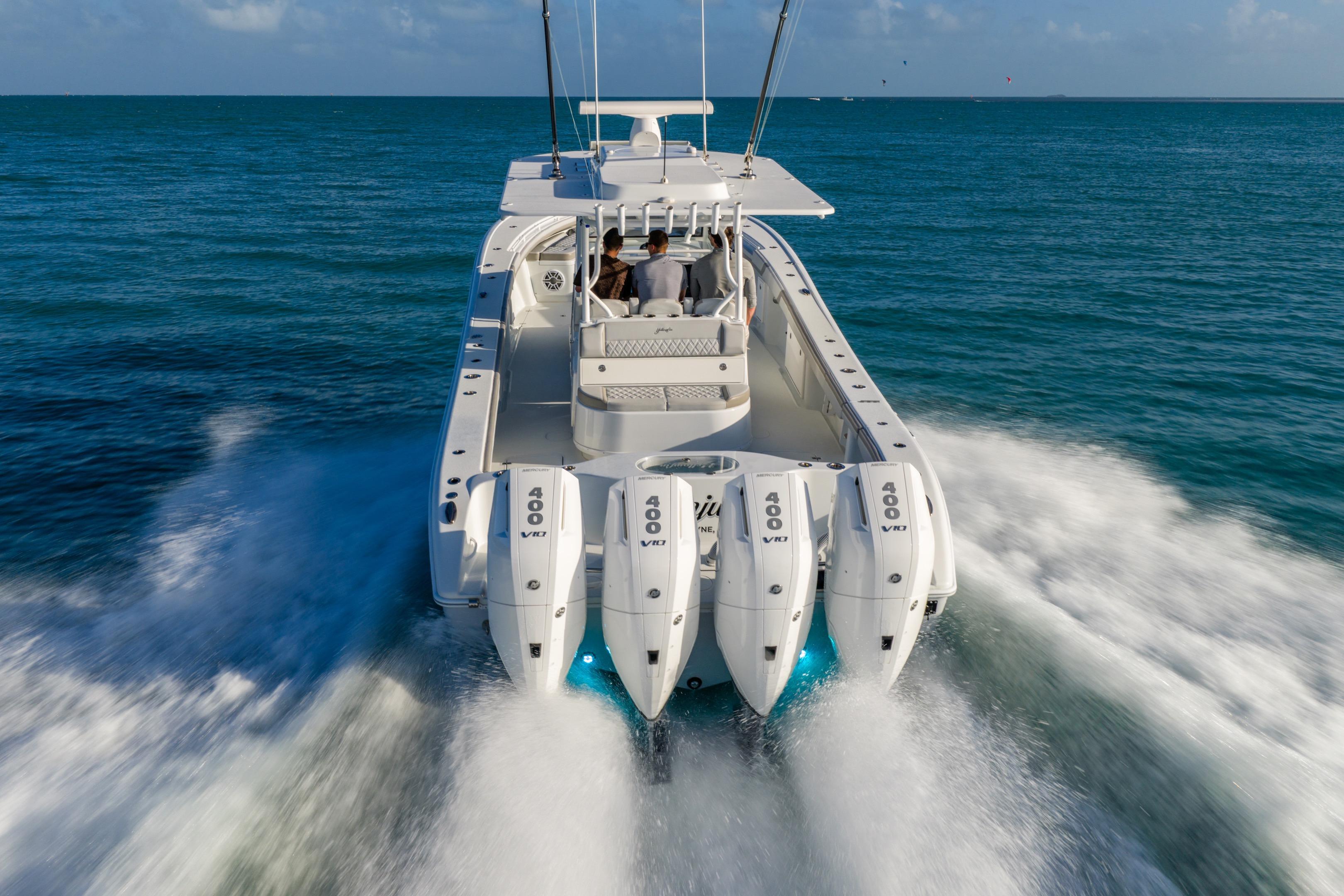 2024 Yellowfin 39 Offshore boat cruising on open water with powerful engines.