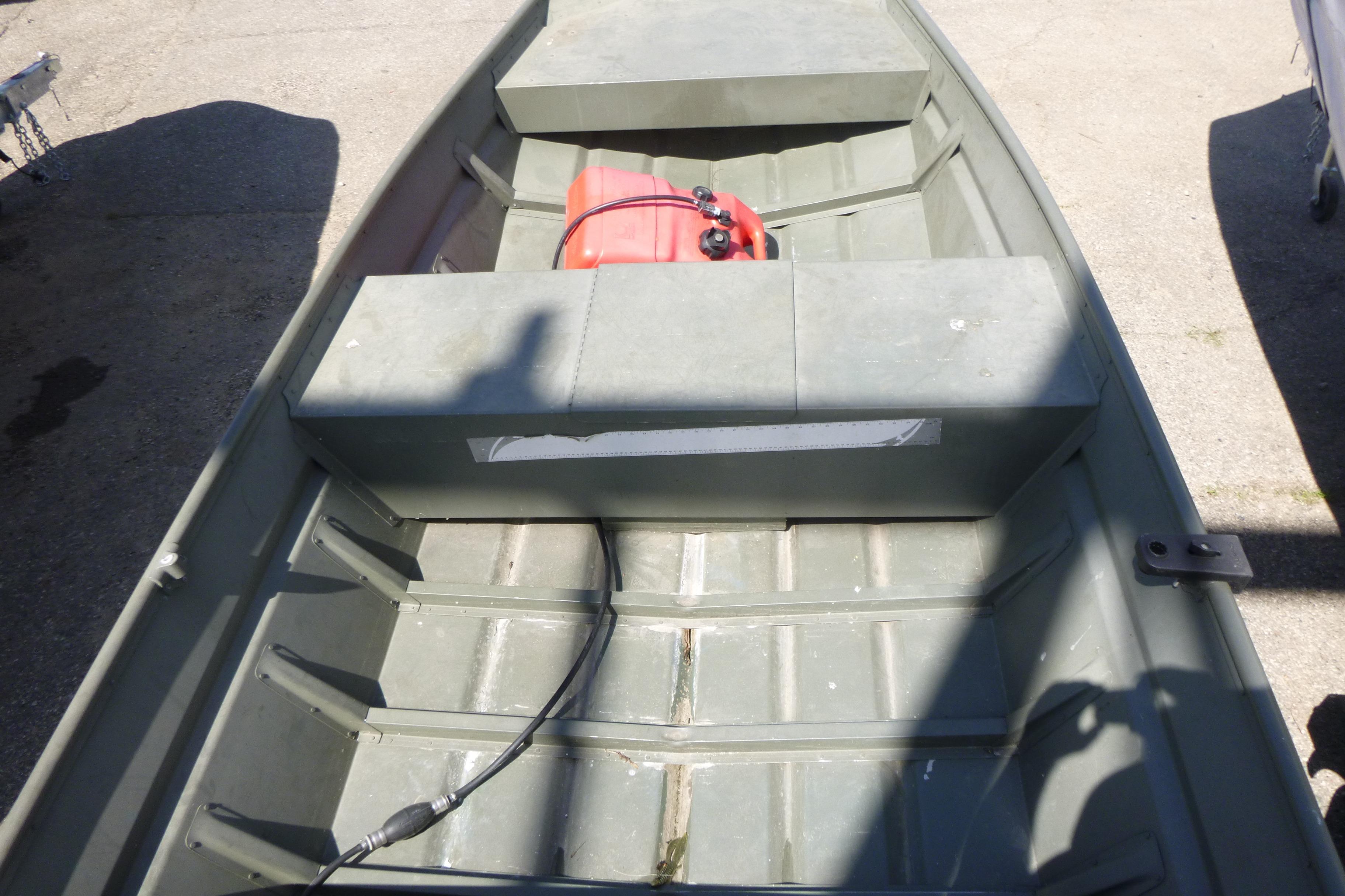 2014 Polar Kraft Jon MV 1448 LW boat interior with fuel tank, shadowed view.