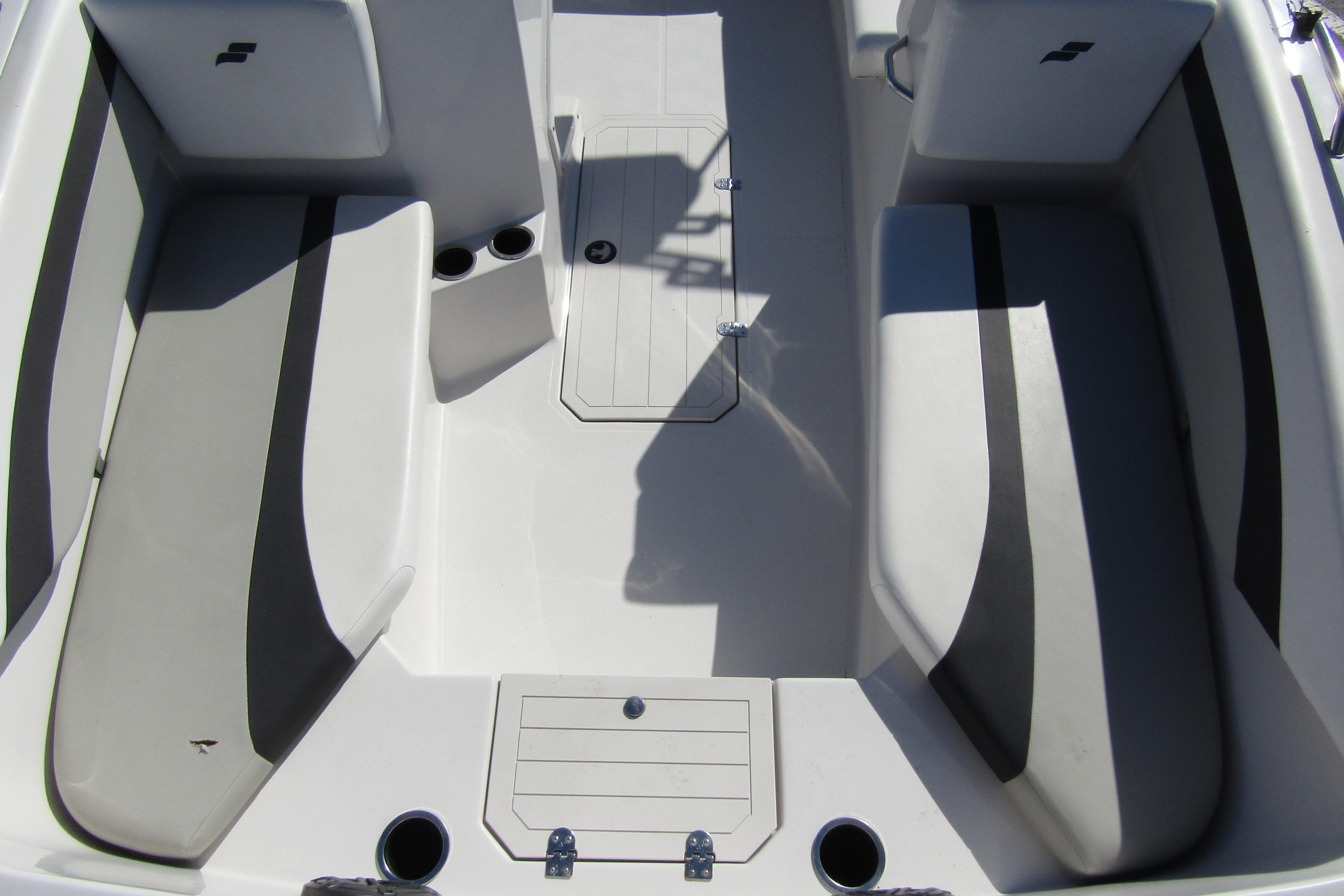 2021 Starcraft SVX 171 OB boat interior with gray seating and storage compartments.