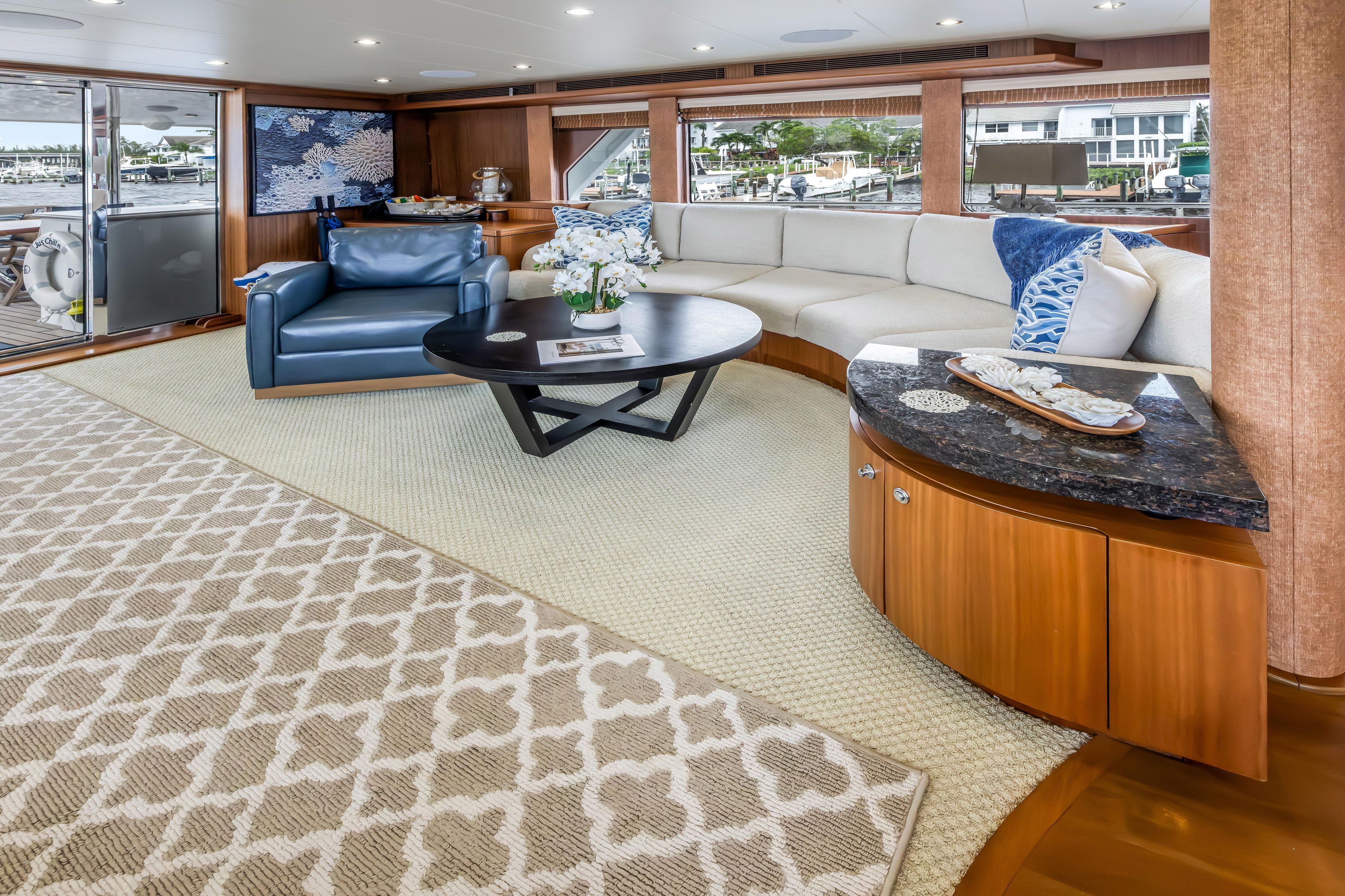 Luxurious interior of 2012 Cheoy Lee 84 Bravo yacht with elegant seating and decor.